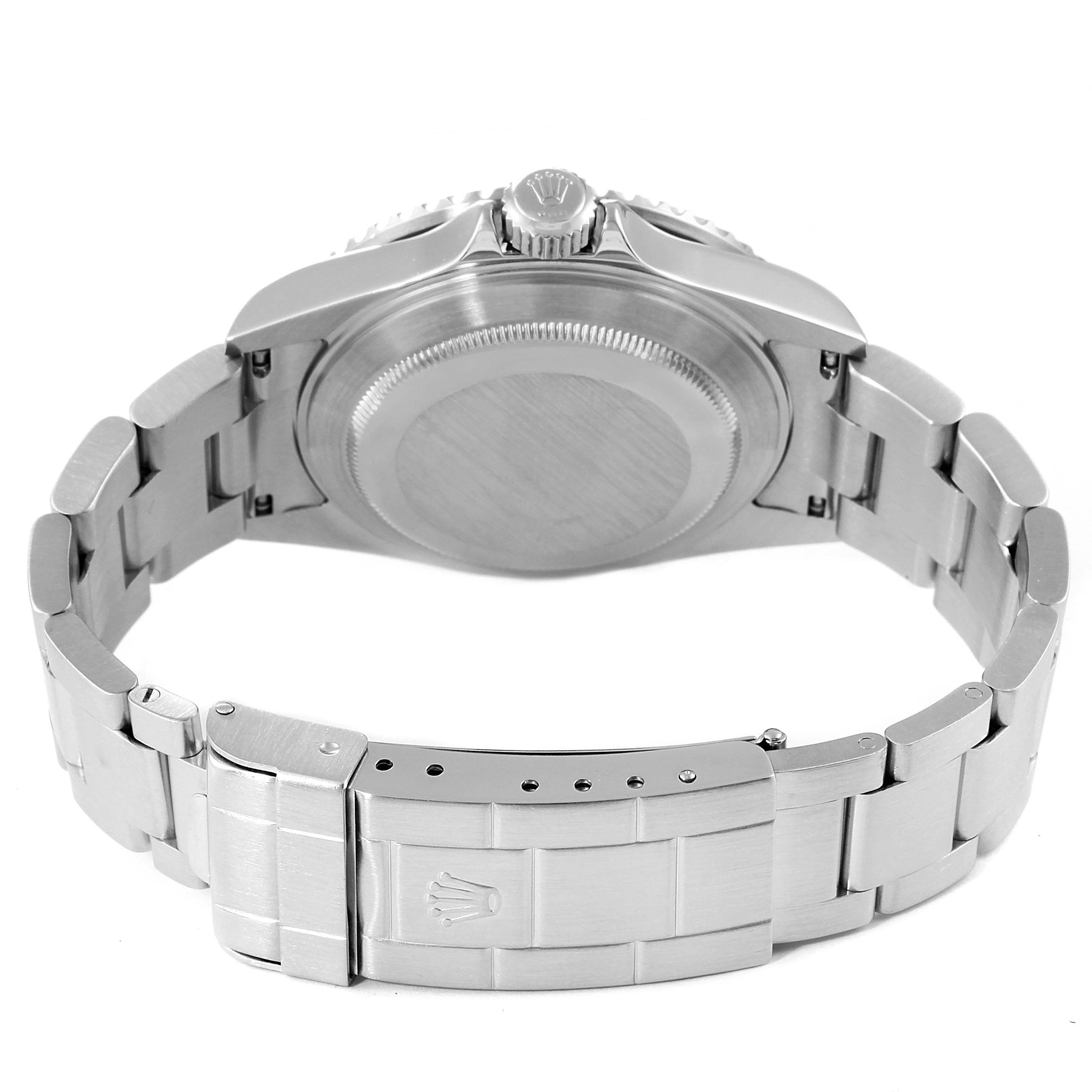 The image shows the back view of a Rolex Submariner 16610 Men's Stainless Steel Black Dial 16610 Men's Stainless Steel Black Dial watch, including the case back, crown, and bracelet with clasp.