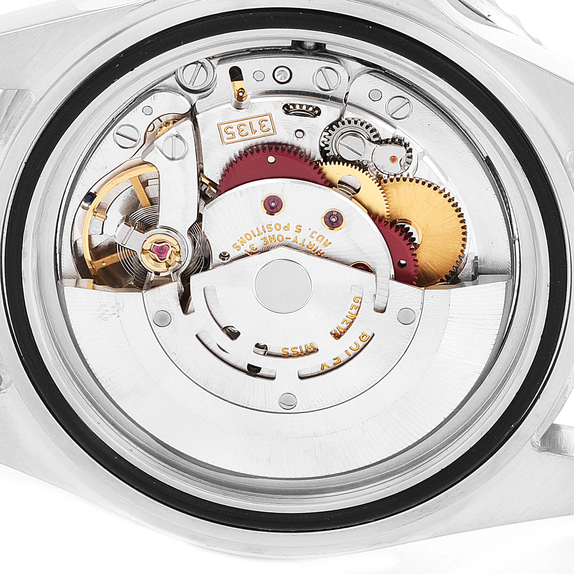 The image shows a close-up view of the movement mechanism of a Rolex Submariner 16610 Men's Stainless Steel Black Dial 16610 Men's Stainless Steel Black Dial watch from the rear.