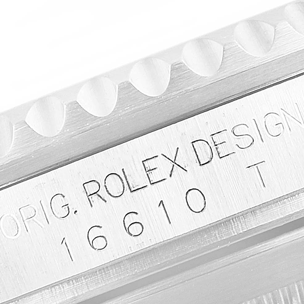 This image shows a close-up of the case side detailing and engraved model number of the Rolex Submariner 16610 Men's Stainless Steel Black Dial 16610 Men's Stainless Steel Black Dial 16610.