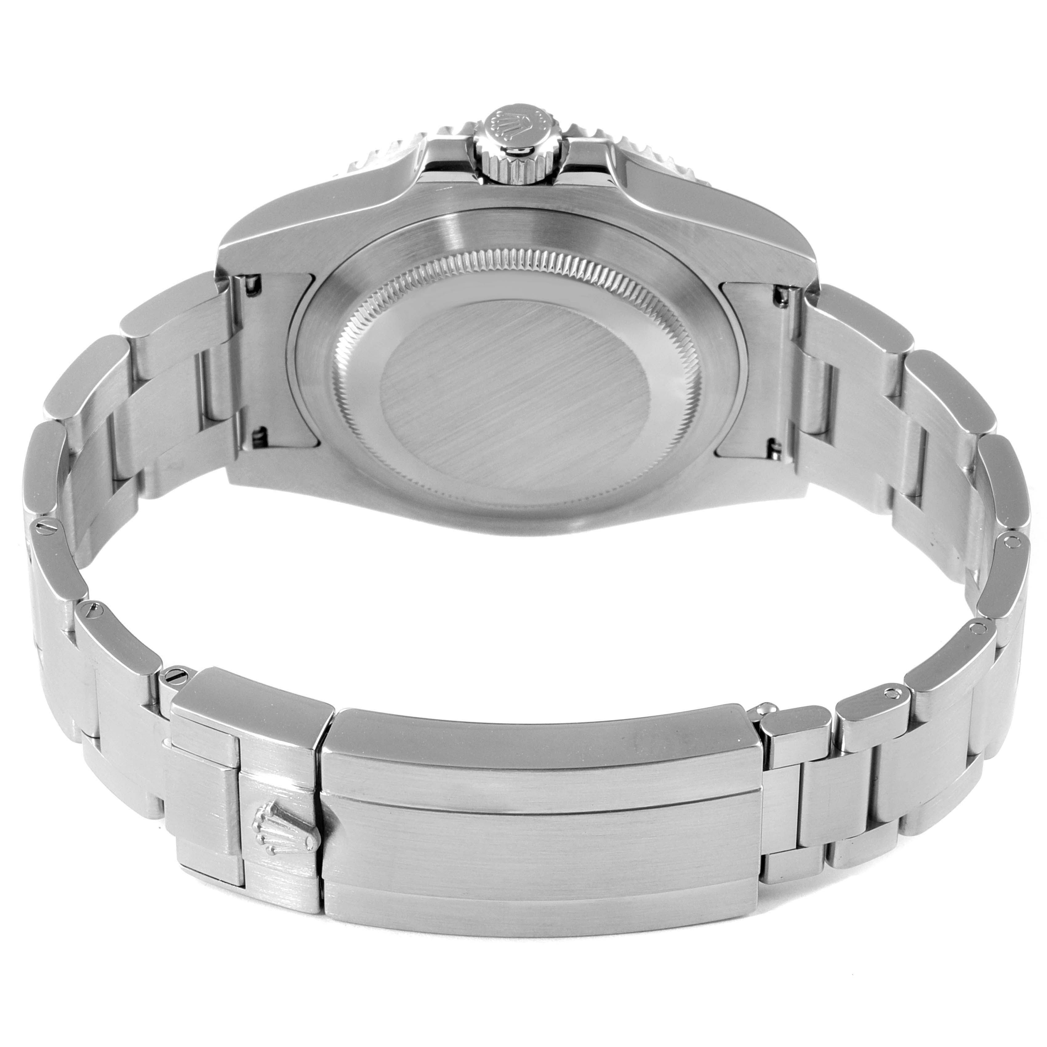 The image shows the back view of a Rolex Submariner 116610LV Men's Stainless Steel Green Dial 116610LV Men's Stainless Steel Green Dial, highlighting its case back, bracelet, and clasp.