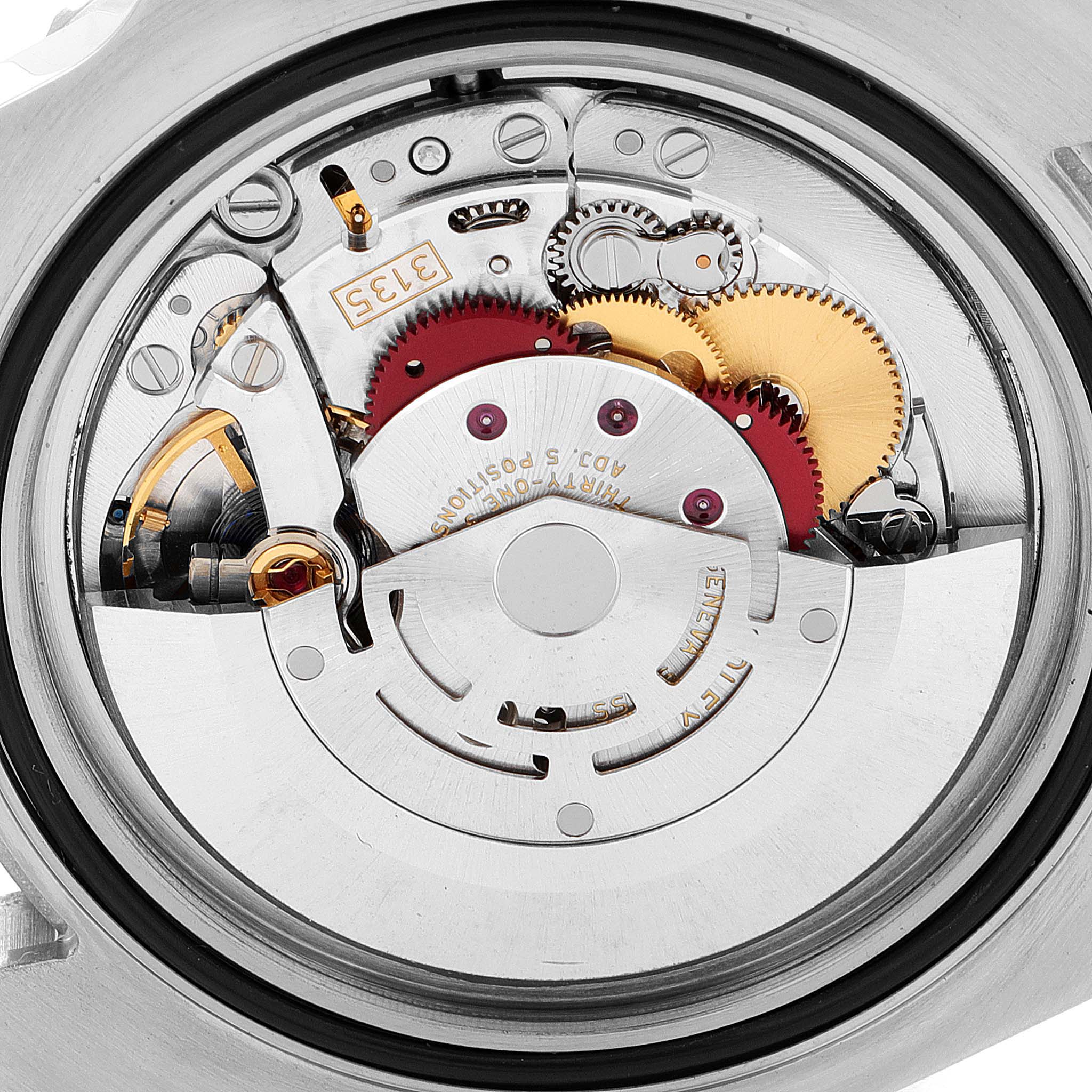 This image shows the intricate inner workings and movement of a Rolex Submariner 116610LV Men's Stainless Steel Green Dial 116610LV Men's Stainless Steel Green Dial watch from a back angle.