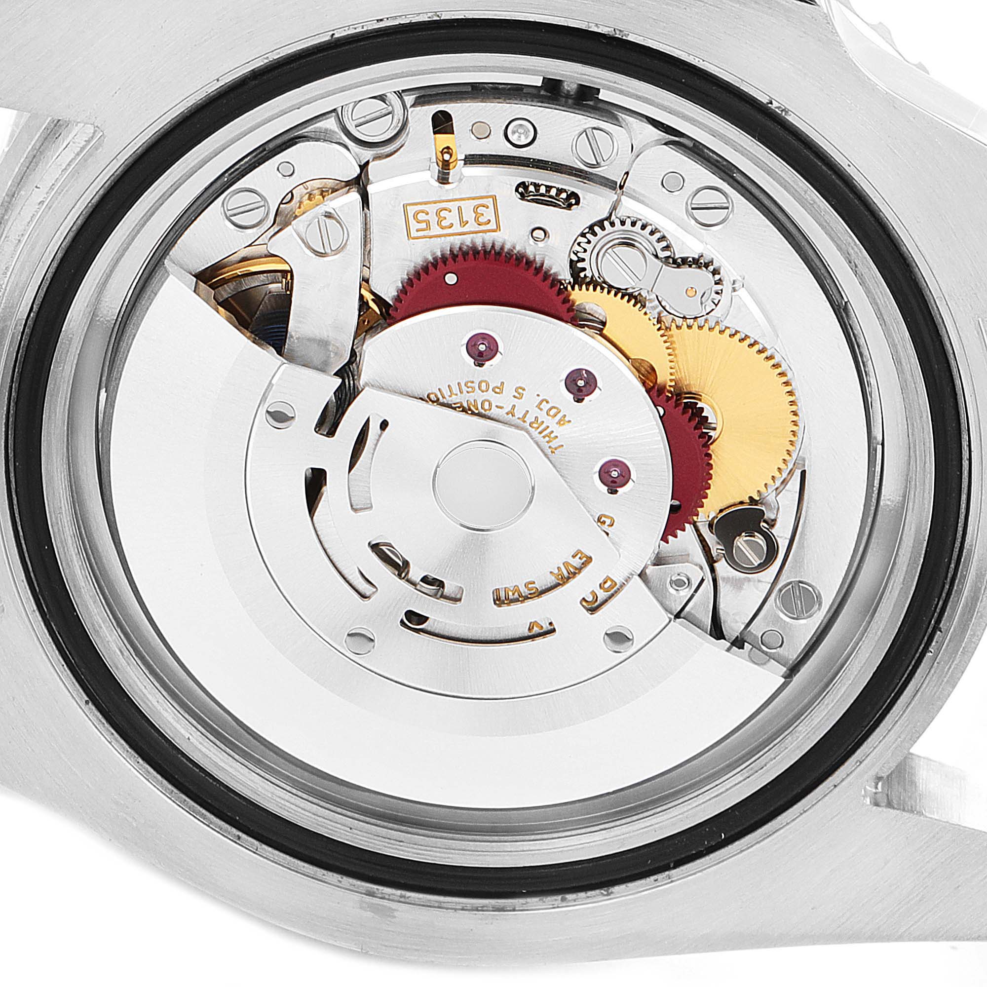 This image shows the inner mechanical movement of a Rolex Submariner 116610LV Men's Stainless Steel Green Dial 116610LV Men's Stainless Steel Green Dial watch from a close-up angle.