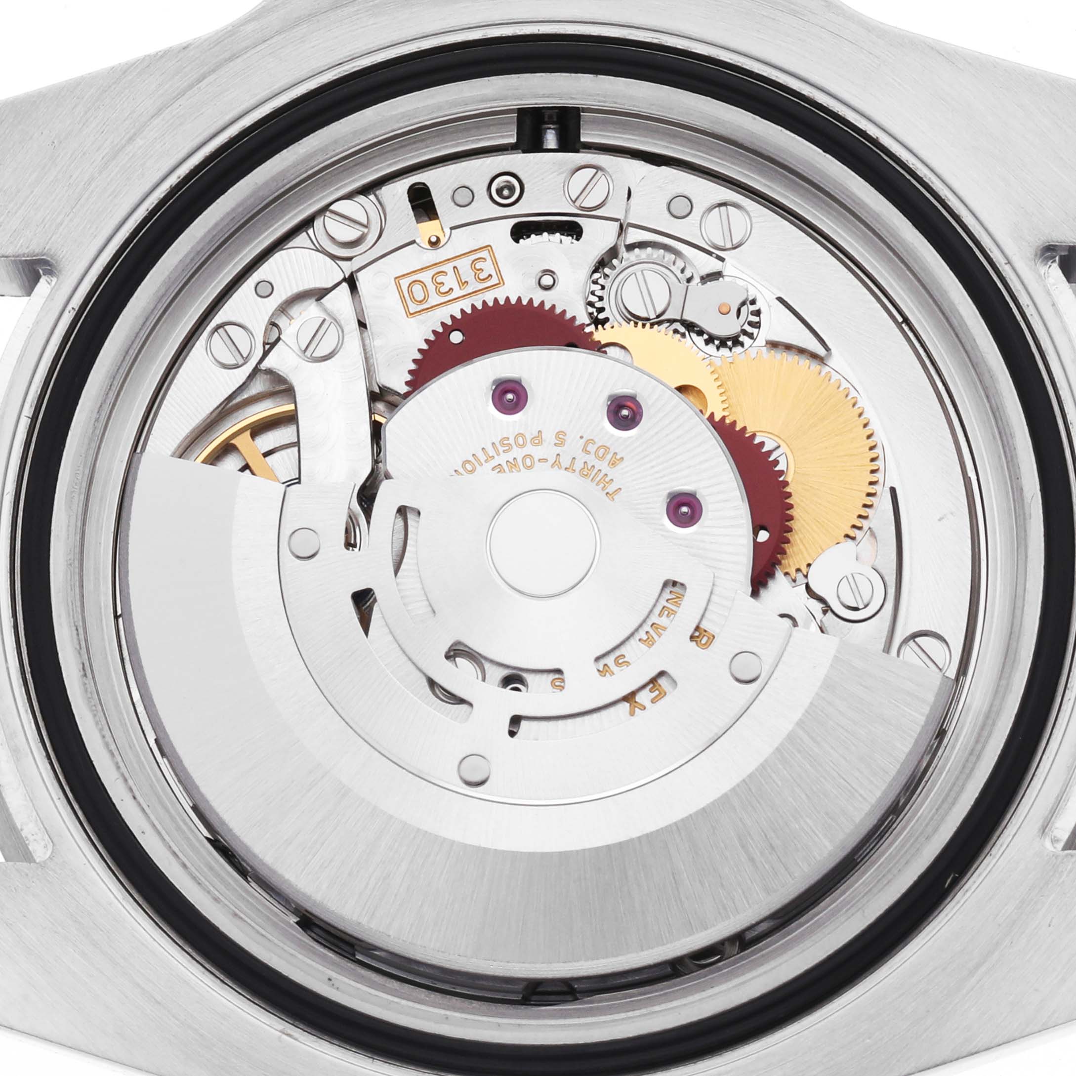 The image shows an overhead view of the Rolex Submariner 114060 Men's Stainless Steel Black Dial's movement, highlighting its complex mechanical parts.