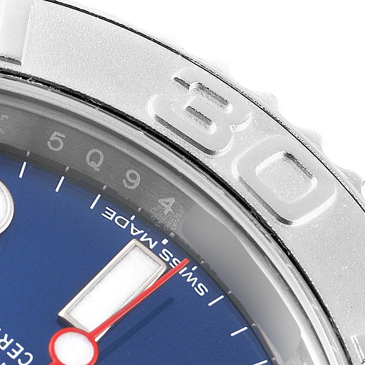 The image shows a close-up of a Rolex Yacht-Master 116622 Men's Stainless Steel Blue Dial 116622 Men's Stainless Steel Blue Dial watch, highlighting the partially visible blue dial, Swiss Made text, and part of the bezel with numbers.