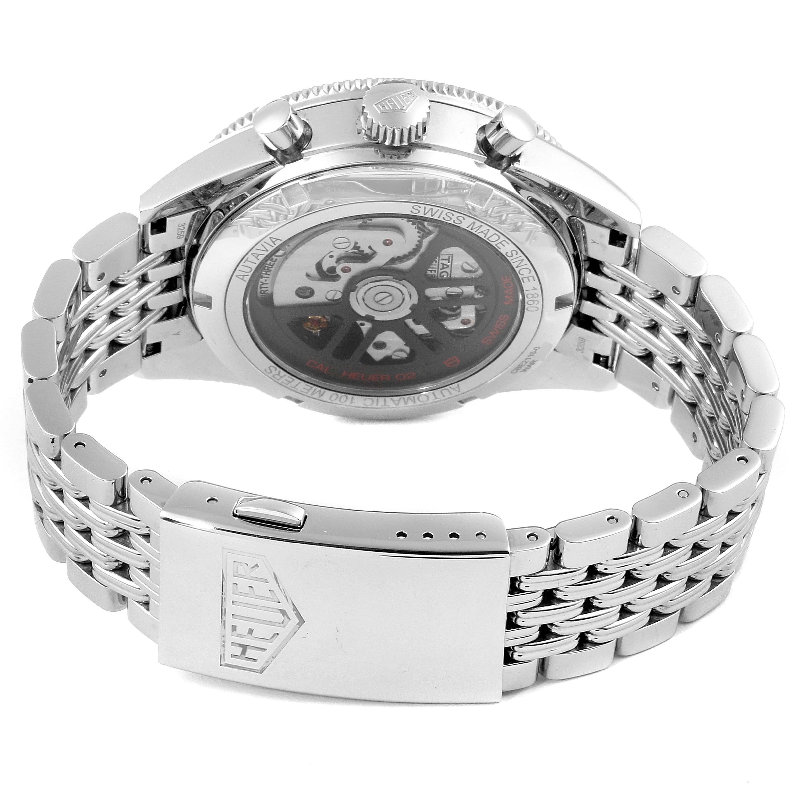 The image shows the back of a Tag Heuer Autavia CBE2110.BA0687 Men's Stainless Steel Black Dial CBE2110.BA0687 Men's Stainless Steel Black Dial watch, highlighting its automatic movement and stainless steel bracelet.