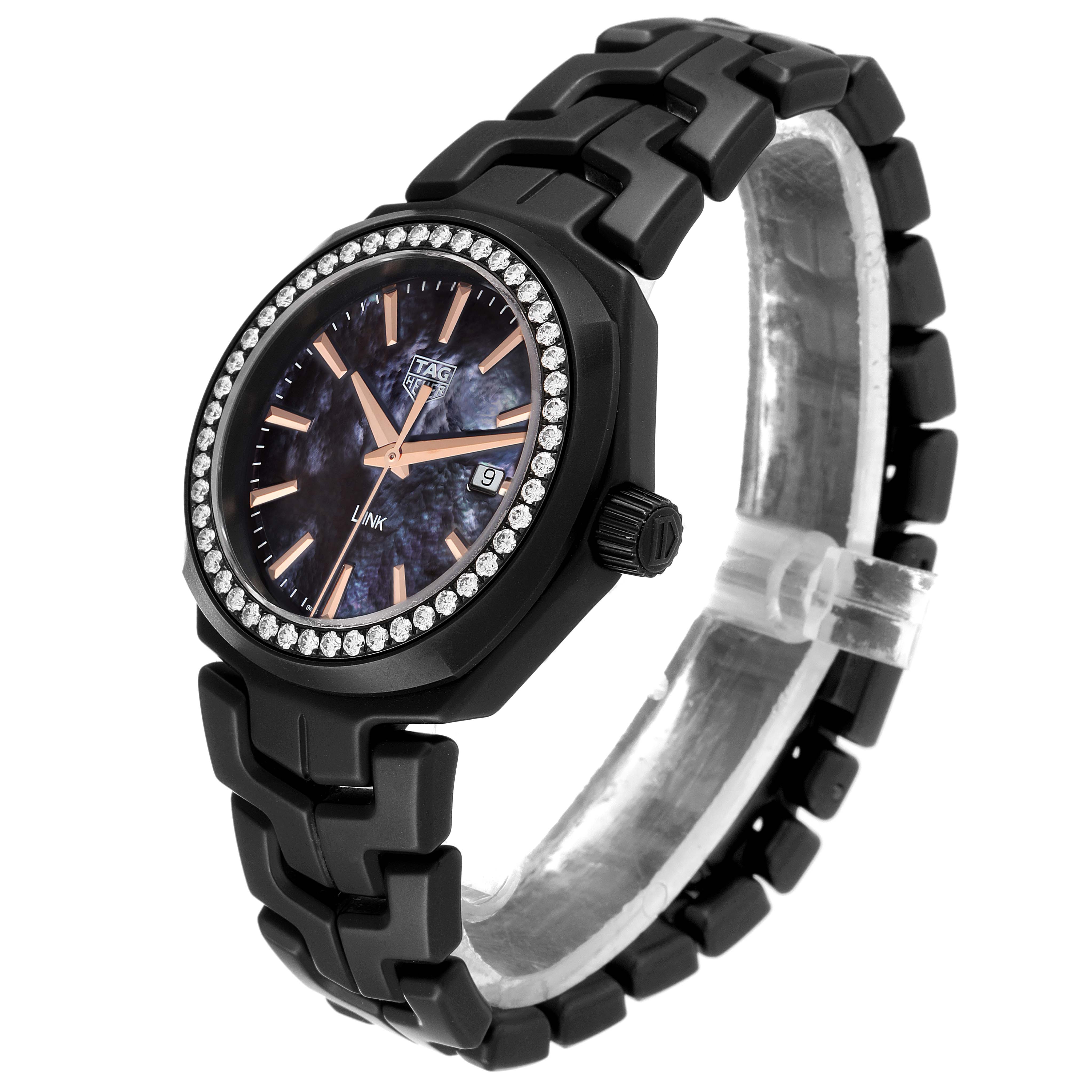 The image shows a black Tag Heuer Link WBC1391.BH0745 Women's Ceramic Mother of Pearl Dial WBC1391.BH0745 Women's Ceramic Mother of Pearl Dial watch from a front-angled view, highlighting the face, bezel, and part of the bracelet.