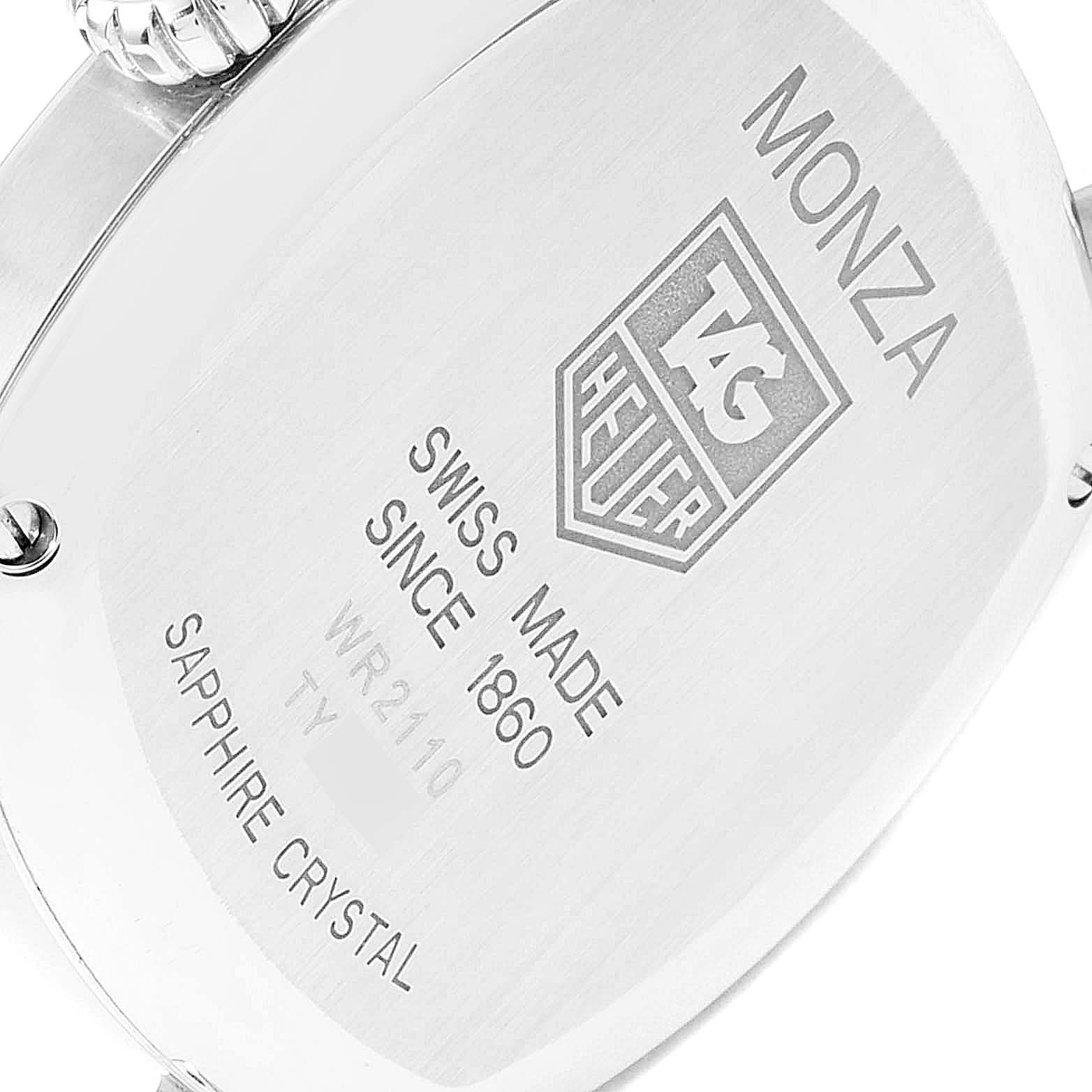 The image shows the back casing of the Tag Heuer Monza WR2110.FC6164 Men
s Stainless Steel Black Dial WR2110.FC6164 Men
s Stainless Steel Black Dial watch, displaying brand details and specifications.