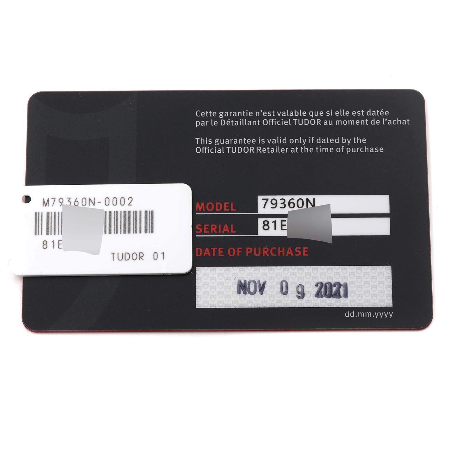 This image shows a warranty card and serial tag for the Tudor Heritage Black Bay M79360N-0002 Men's Stainless Steel White Dial M79360N-0002 Men's Stainless Steel White Dial model 79360N with a purchase date of November 9, 2021.