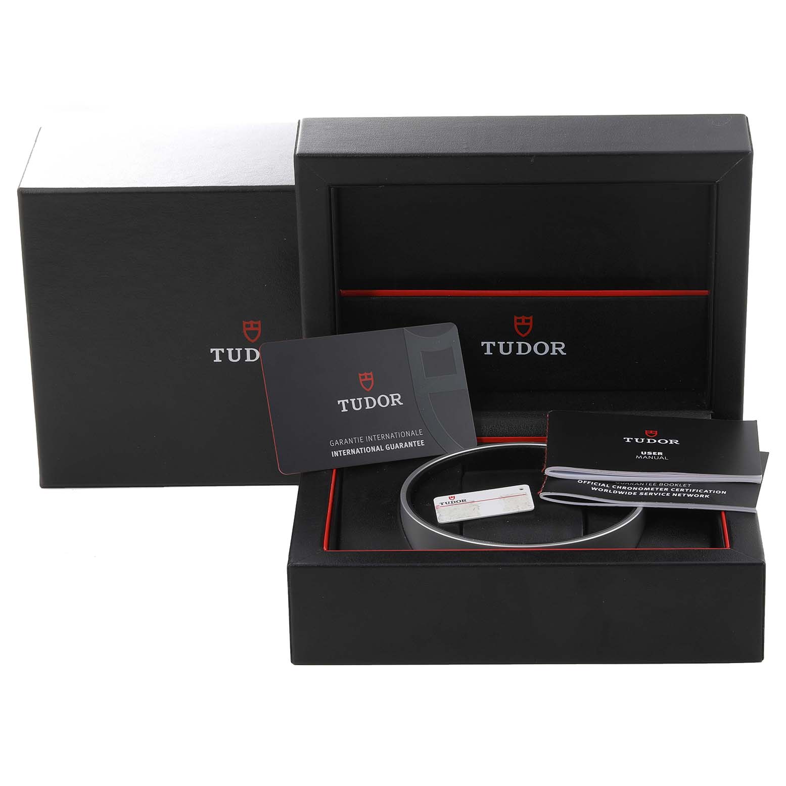 The image shows an open Tudor Heritage Black Bay M79360N-0002 Men's Stainless Steel White Dial M79360N-0002 Men's Stainless Steel White Dial watch box with accompanying warranty and user manuals.