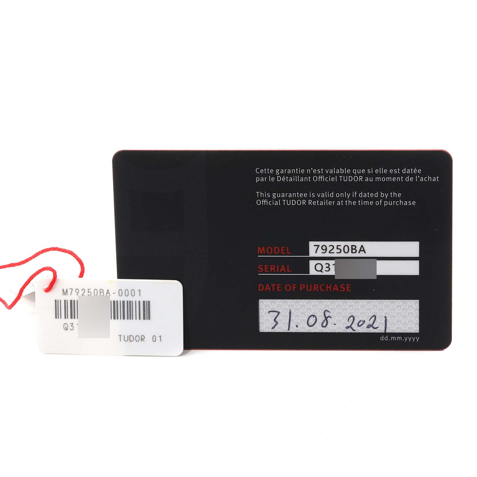 This image shows a guarantee card and tag for the Tudor Heritage Black Bay 79250BA Men's Bronze Black Dial 79250BA Men's Bronze Black Dial model watch, displaying the model, serial number, and date of purchase.