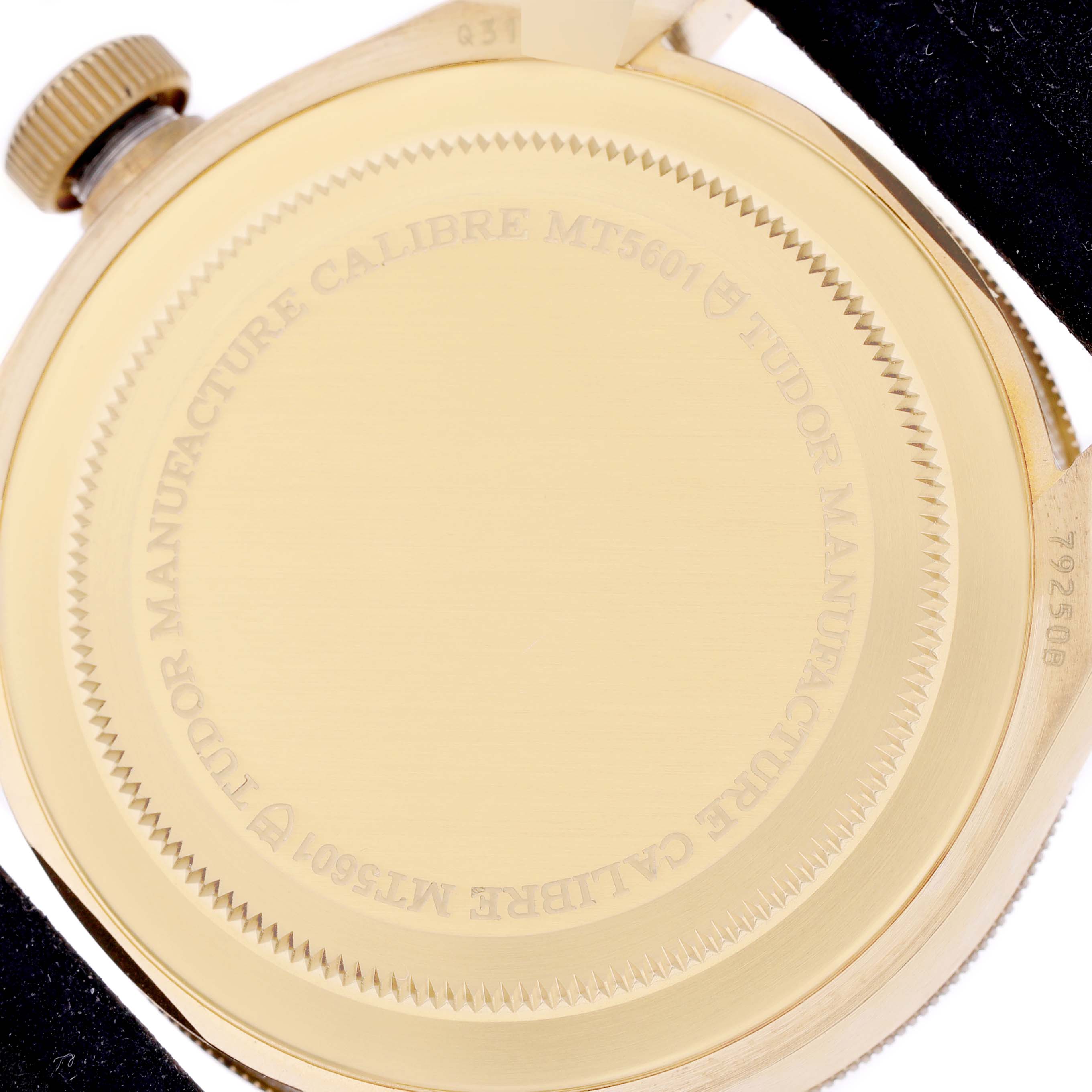 The image shows the back of the Tudor Heritage Black Bay 79250BA Men's Bronze Black Dial 79250BA Men's Bronze Black Dial watch, highlighting the caseback and crown.