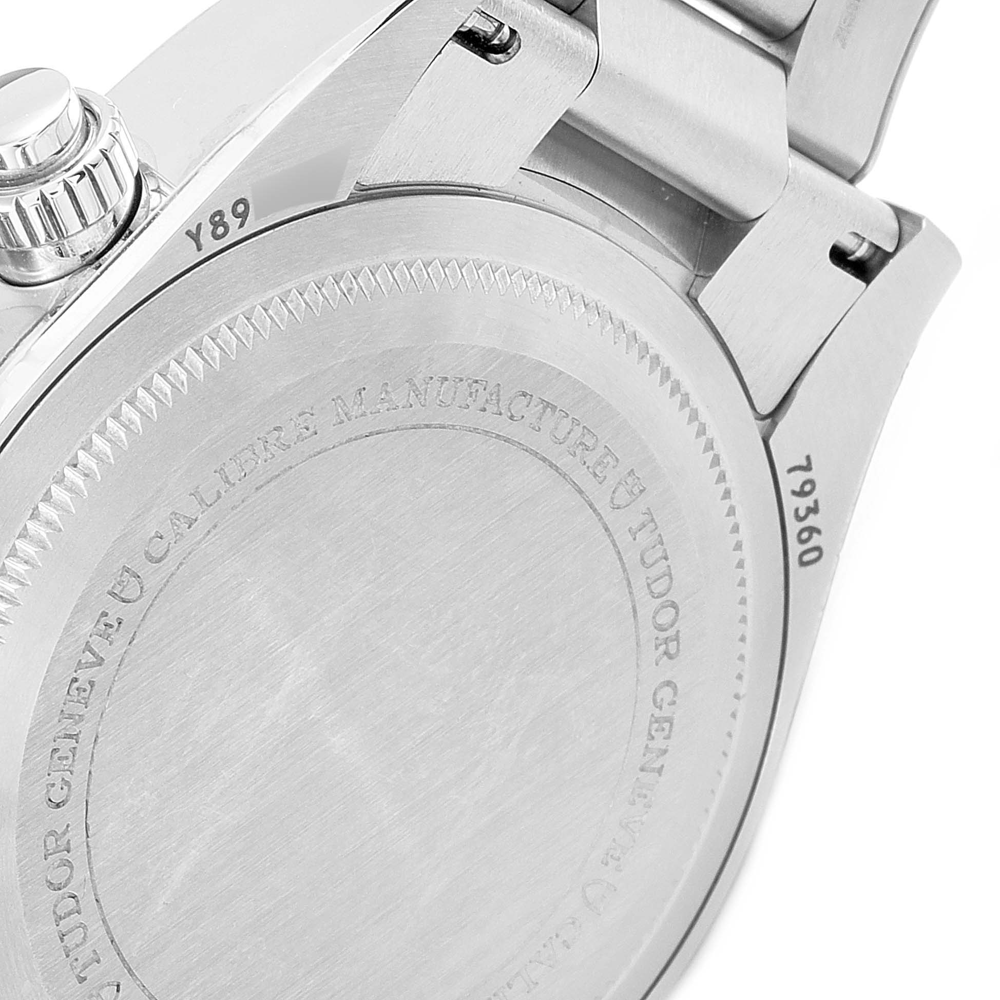 This image shows the back case and part of the bracelet of a Tudor Heritage Black Bay 79360N Men's Stainless Steel Black Dial 79360N Men's Stainless Steel Black Dial watch.