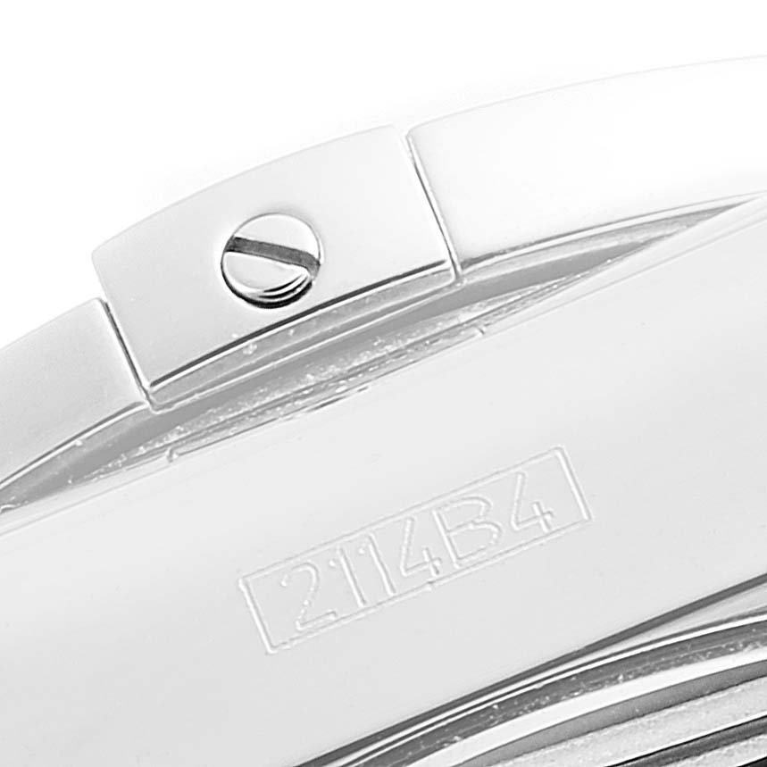 This image displays a close-up, side angle of the clasp on a Breitling Chronomat AB0141 Men
s Stainless Steel Silver Dial AB0141 Men
s Stainless Steel Silver Dial watch, showcasing a screw and engraved code.
