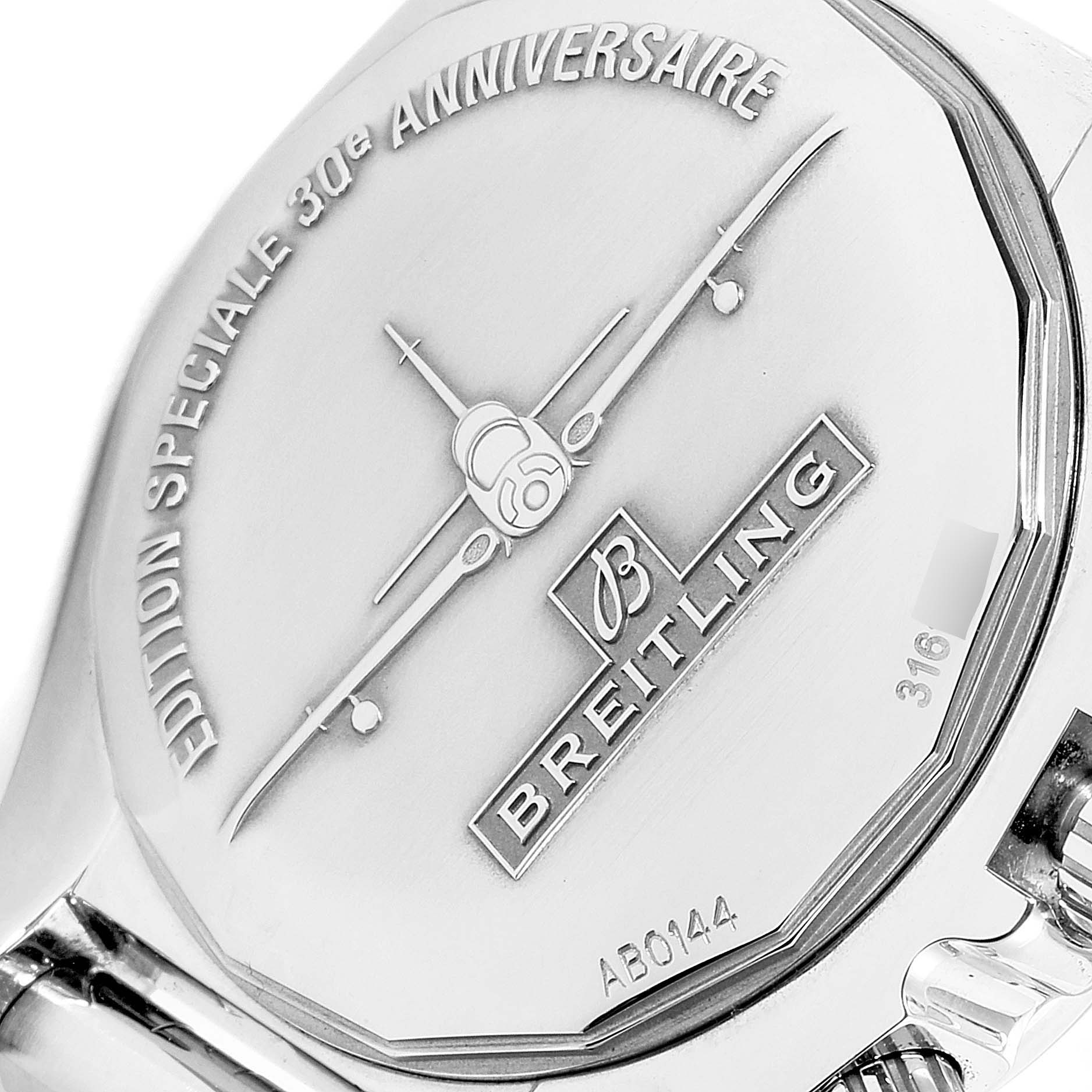 The image shows the back case of the Breitling Chronomat AB0141 Men
s Stainless Steel Silver Dial AB0141 Men
s Stainless Steel Silver Dial watch, highlighting the "Edition Speciale 30e Anniversaire" engraving.