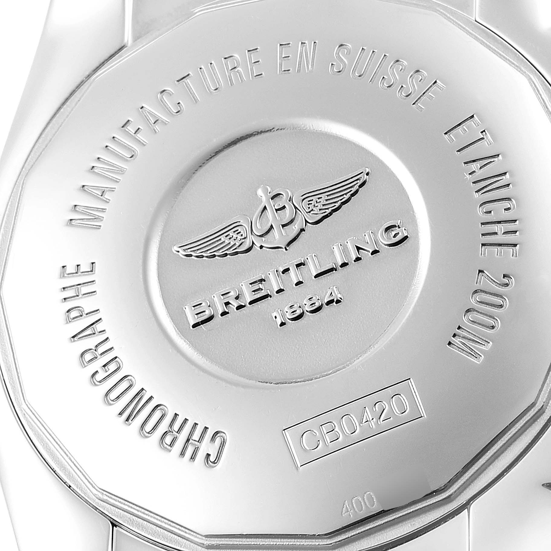 The image shows the back case of a Breitling Chronomat CB0420 Men's Steel and Gold (two tone) Silver Dial CB0420 Men's Steel and Gold (two tone) Silver Dial watch, displaying branding and engravings.