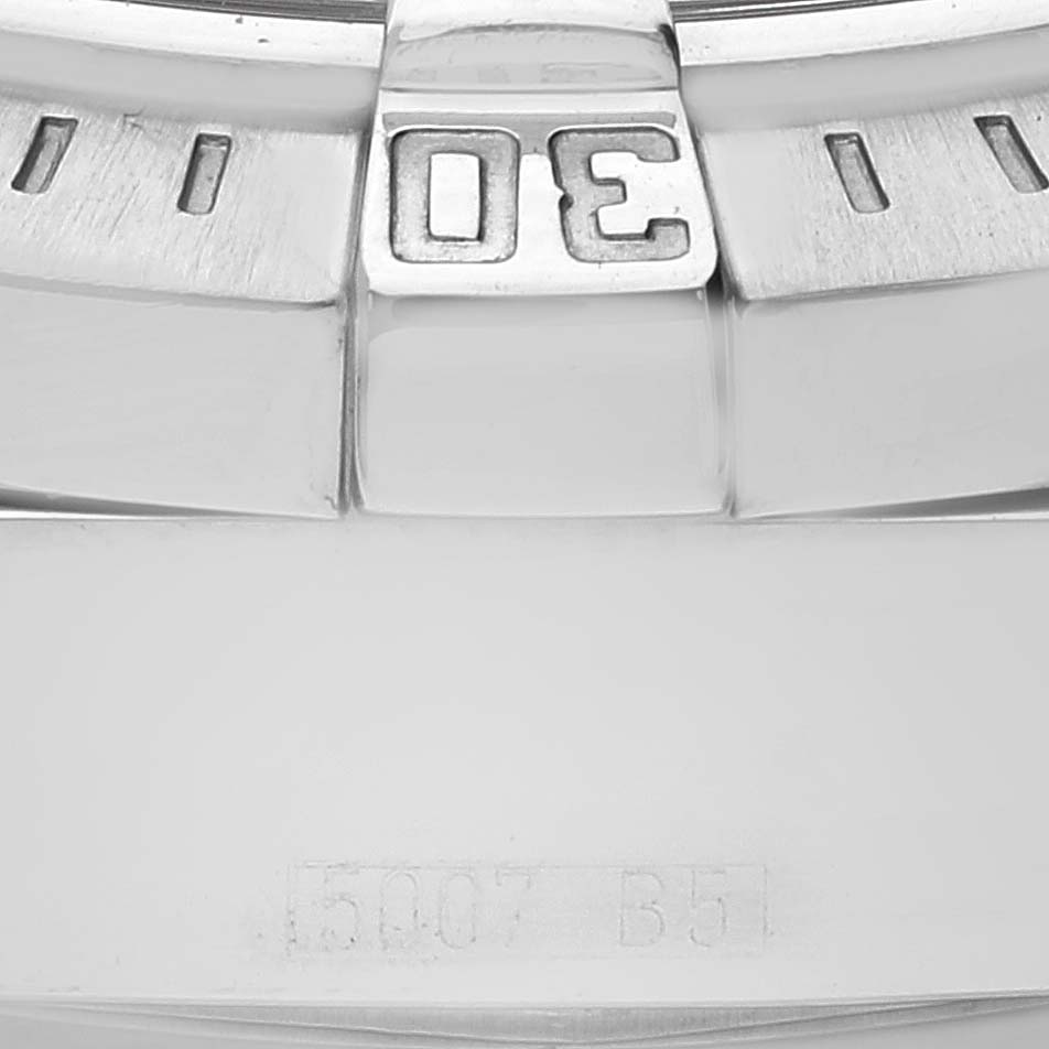 Close-up shot of the bezel and part of the dial of a Breitling Colt A73380 Men's Stainless Steel White Dial A73380 Men's Stainless Steel White Dial watch, showing the "30" minute mark.