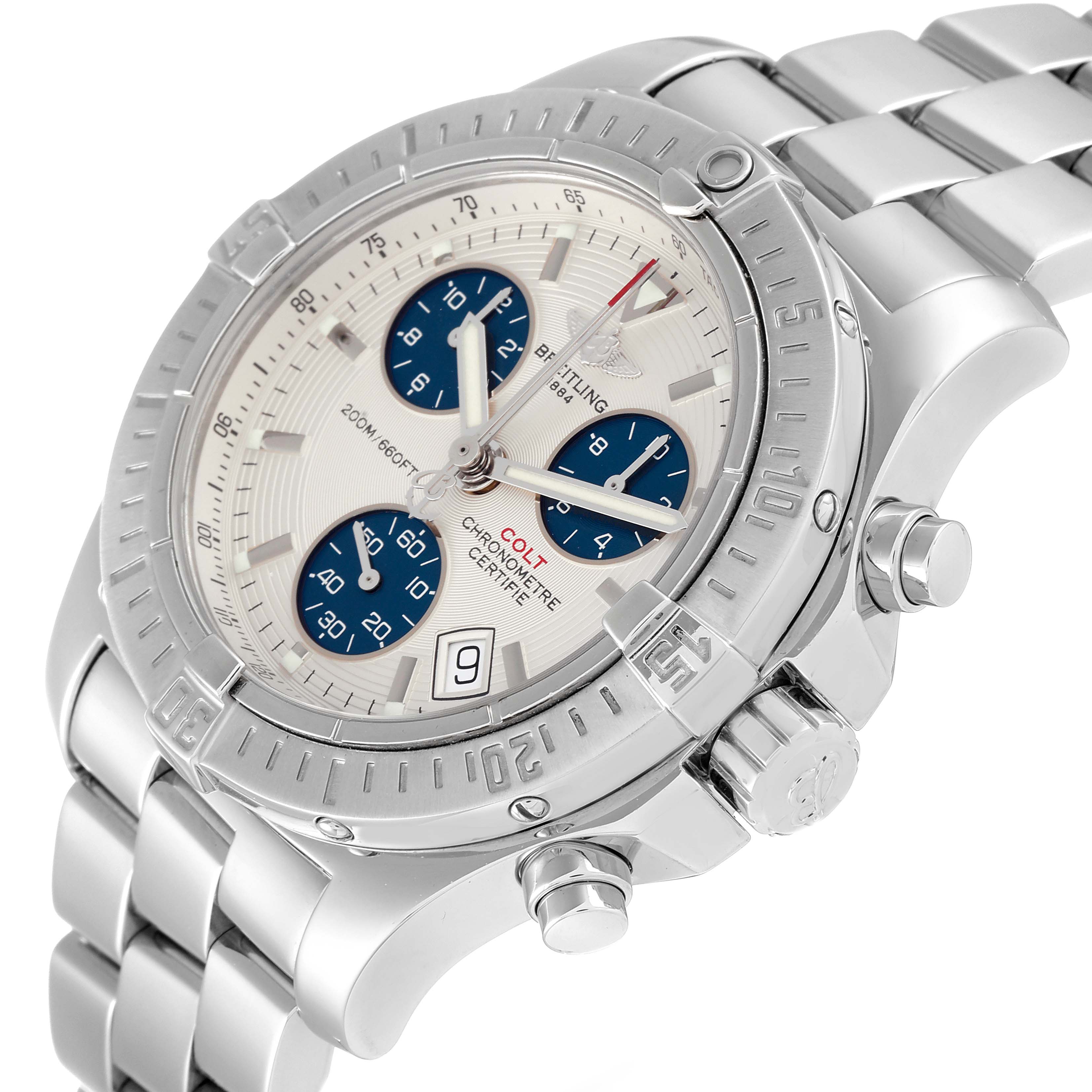 The image shows a Breitling Colt A73380 Men's Stainless Steel White Dial A73380 Men's Stainless Steel White Dial watch at an angle displaying its face, bezel, crown, chronograph subdials, and stainless steel bracelet.
