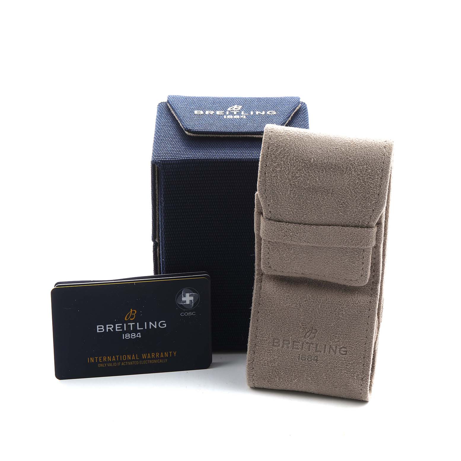 The image shows Breitling Premier A25310 Men's Stainless Steel Red Dial accessories: a warranty card, a blue box, and a beige watch pouch.