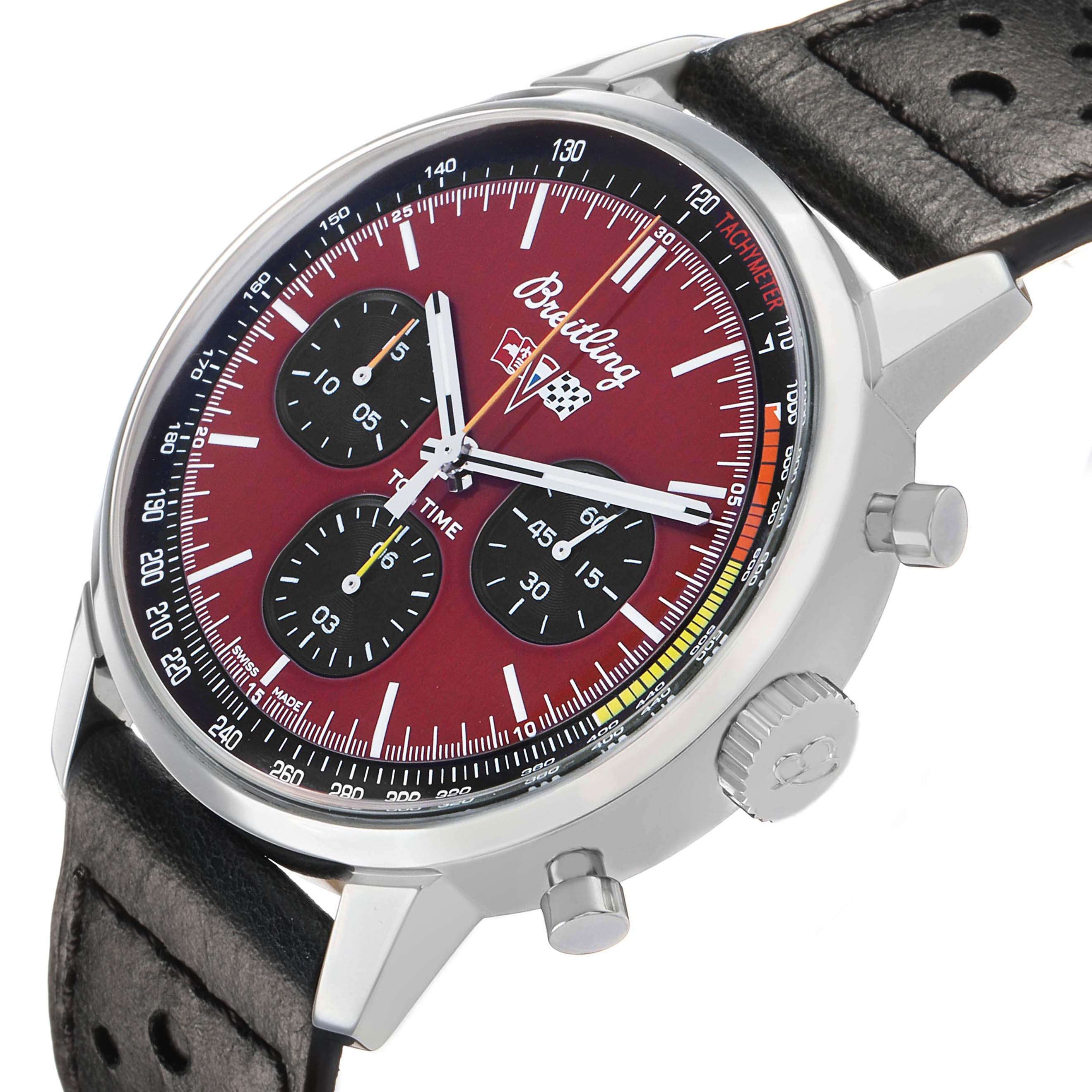 The Breitling Premier A25310 Men's Stainless Steel Red Dial watch is shown at an angled view, highlighting its dial, subdials, crown, and leather strap.