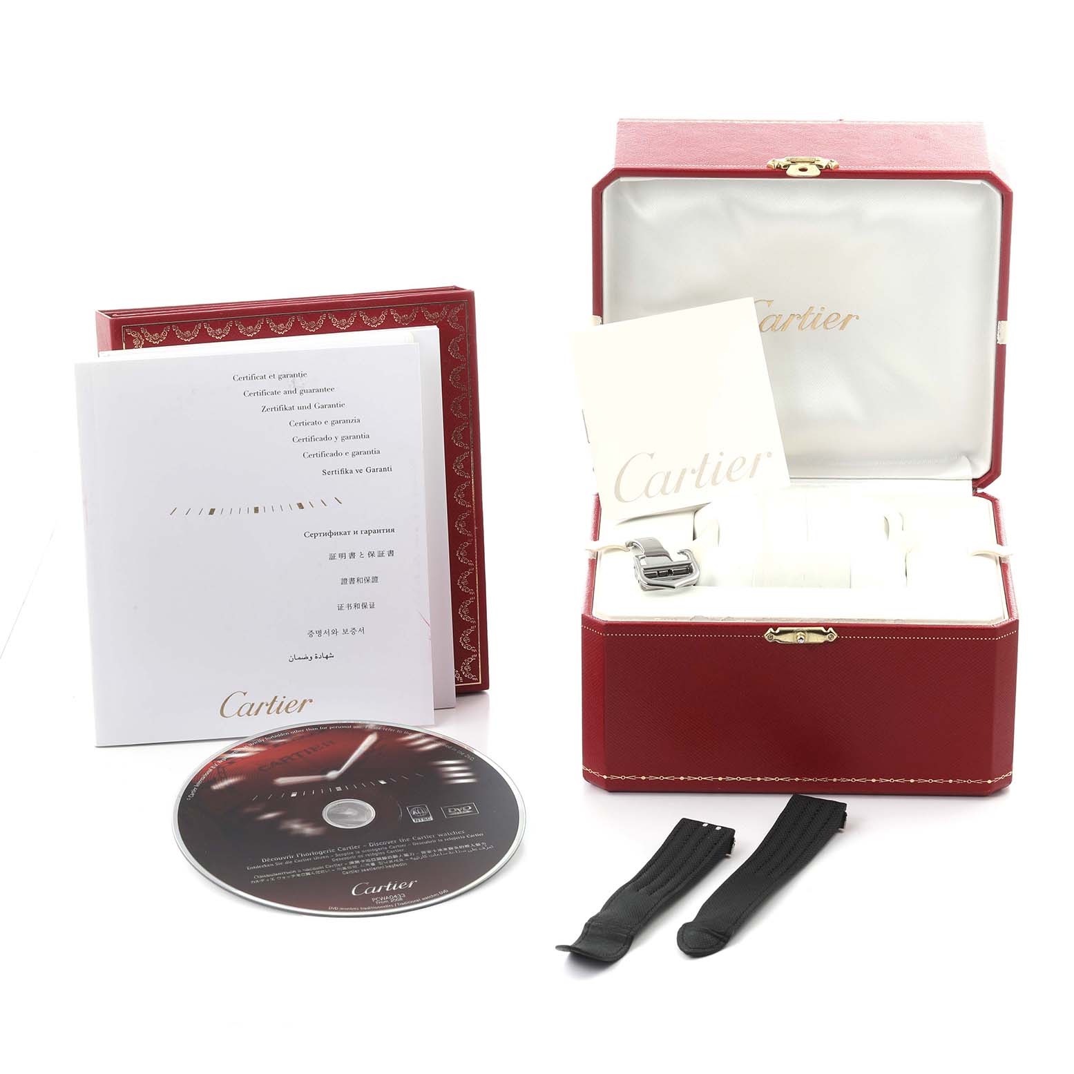 The Cartier Roadster W62020X6 Men's Stainless Steel Black Dial W62020X6 Men's Stainless Steel Black Dial accessories include a red box, manual, CD, and additional straps shown from a slightly above and frontal angle.