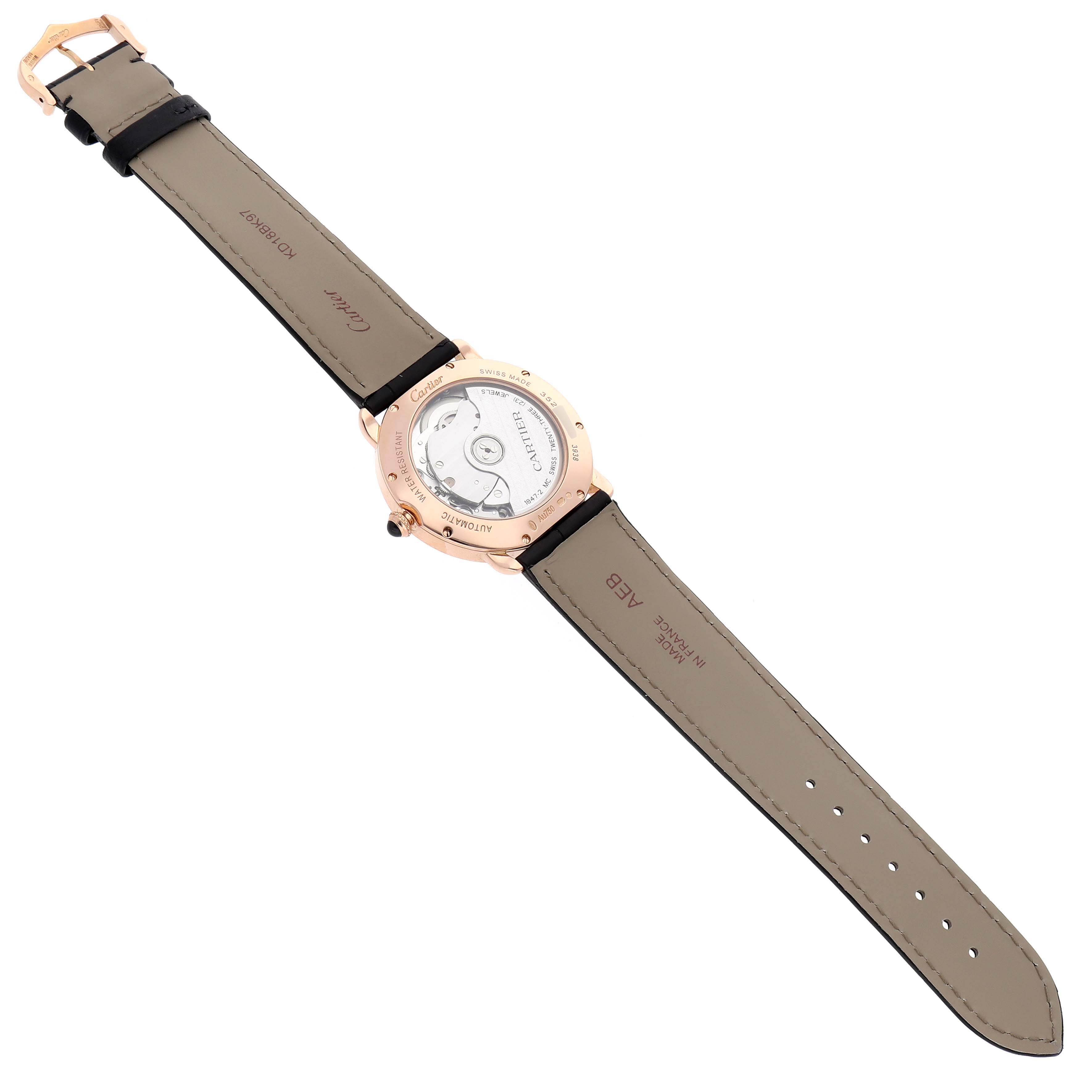 The image shows the back view of a Cartier Ronde WGRN0006 Men's Rose Gold Silver Dial watch, highlighting the transparent case back and leather strap.