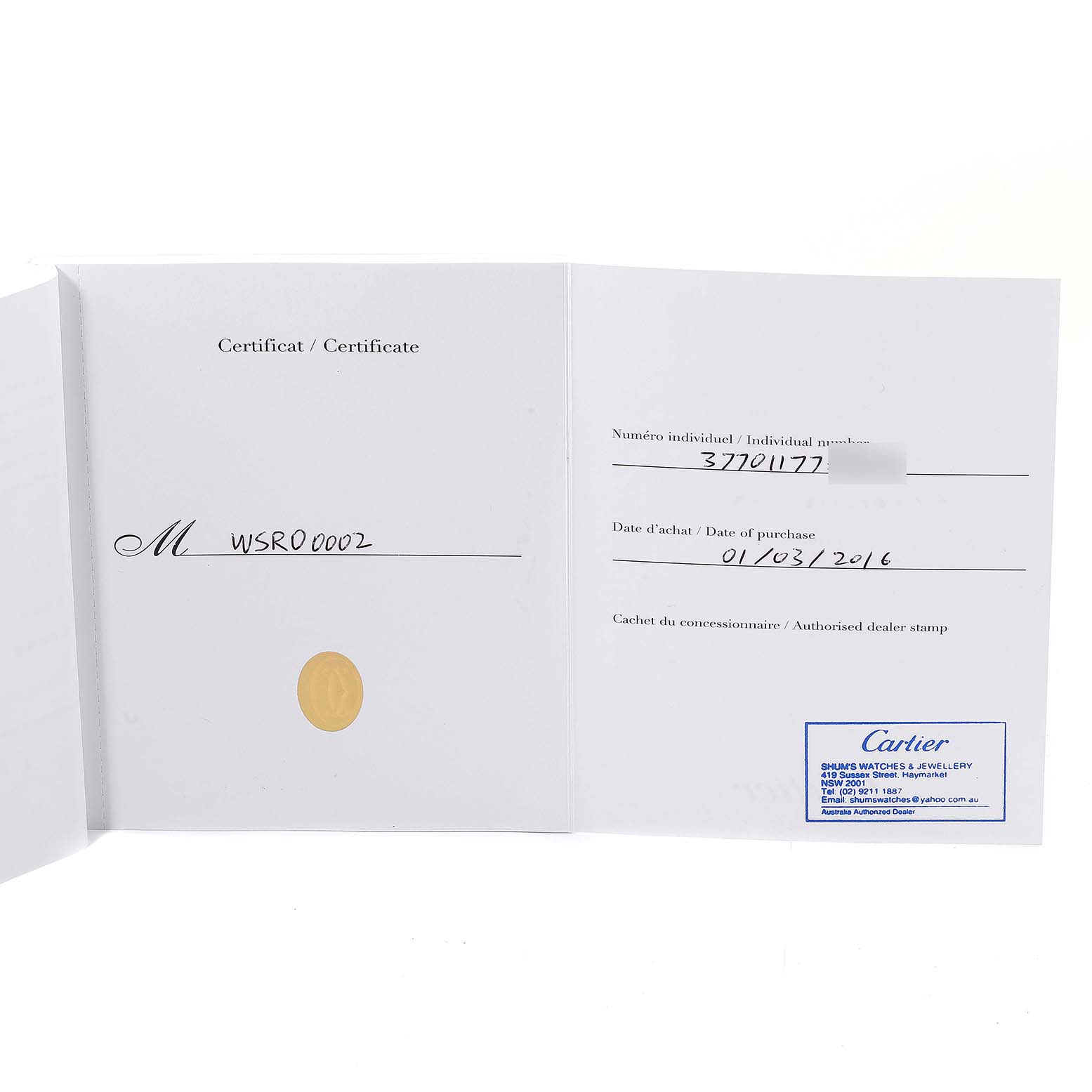 This image shows the open warranty certificate for a Rotonde model by Cartier, including purchase details and dealer stamp.