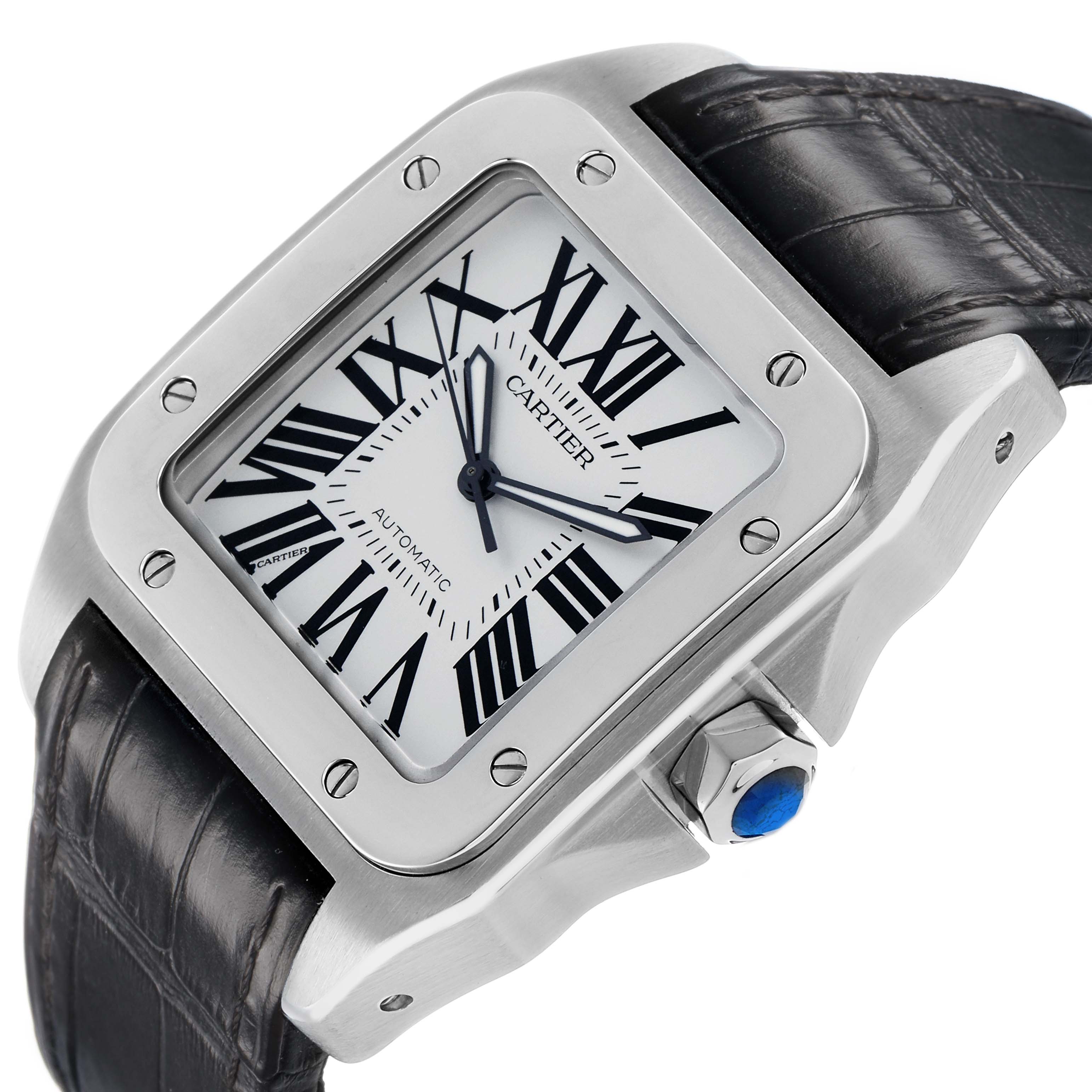 The image shows a Cartier Santos W20073X8 Men's Stainless Steel Silver Dial watch at an angle highlighting the square face, Roman numerals, bezel, and black leather strap.