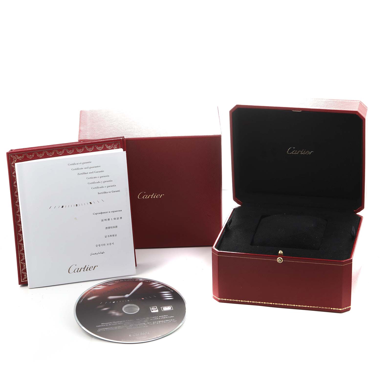 The image shows a Cartier Santos Demoiselle WF9011Z8 Women's Rose Gold Silver Dial watch box, certificate booklet, and a CD from a top angle.