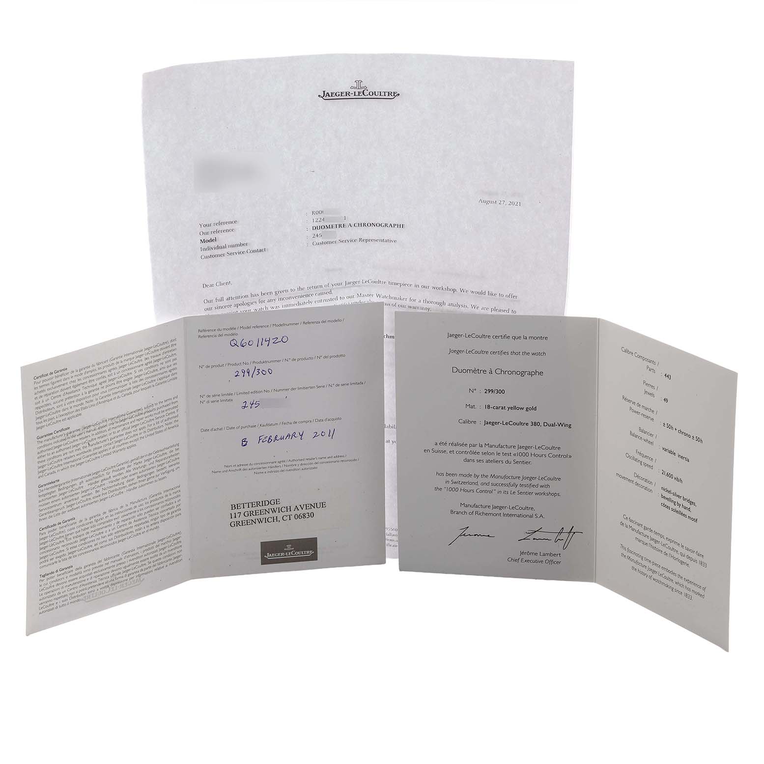 The image shows documentation for a Jaeger LeCoultre Duometre Q6011420 Men's Yellow Gold Beige Dial watch, including certificates and informational booklets.