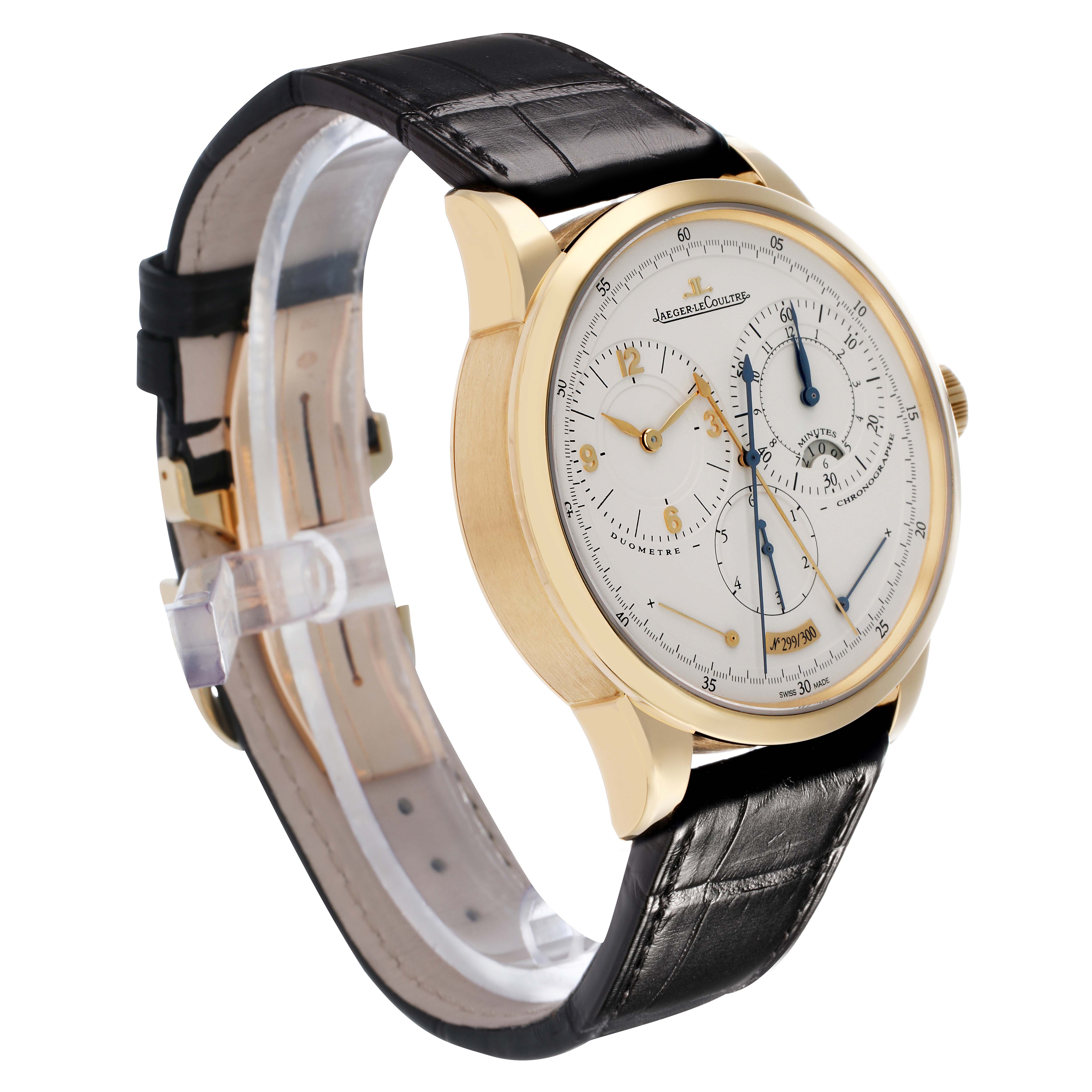 The Jaeger-LeCoultre Duometre watch is shown at a three-quarter angle, highlighting the gold case, dial, and black leather strap.