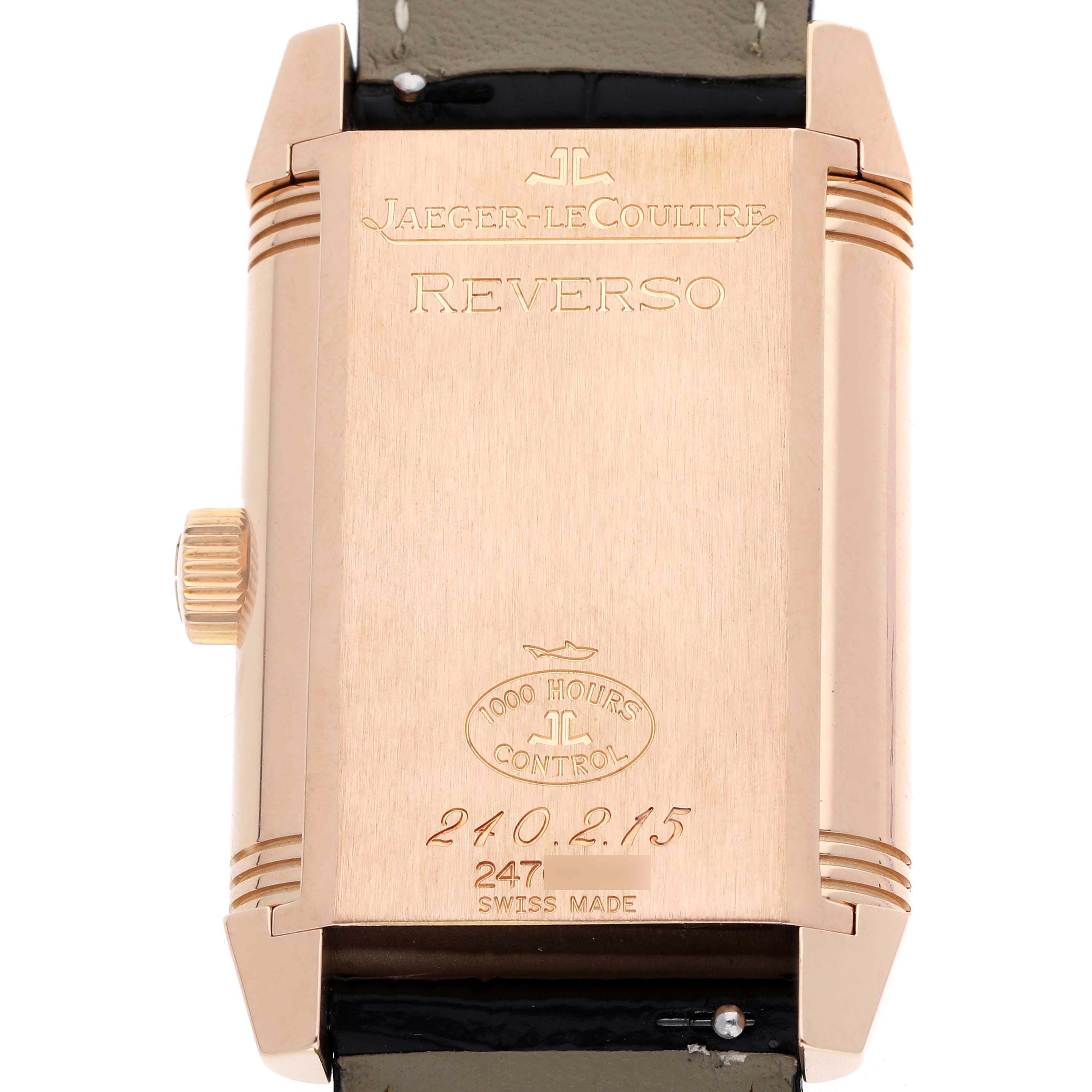 The image shows the back of the Jaeger-LeCoultre Reverso watch, highlighting the case, engravings, and side crown.