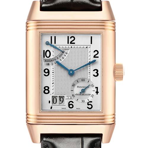 The image shows a Jaeger-LeCoultre Reverso watch from a front view, displaying its dial, hands, crown, and strap.