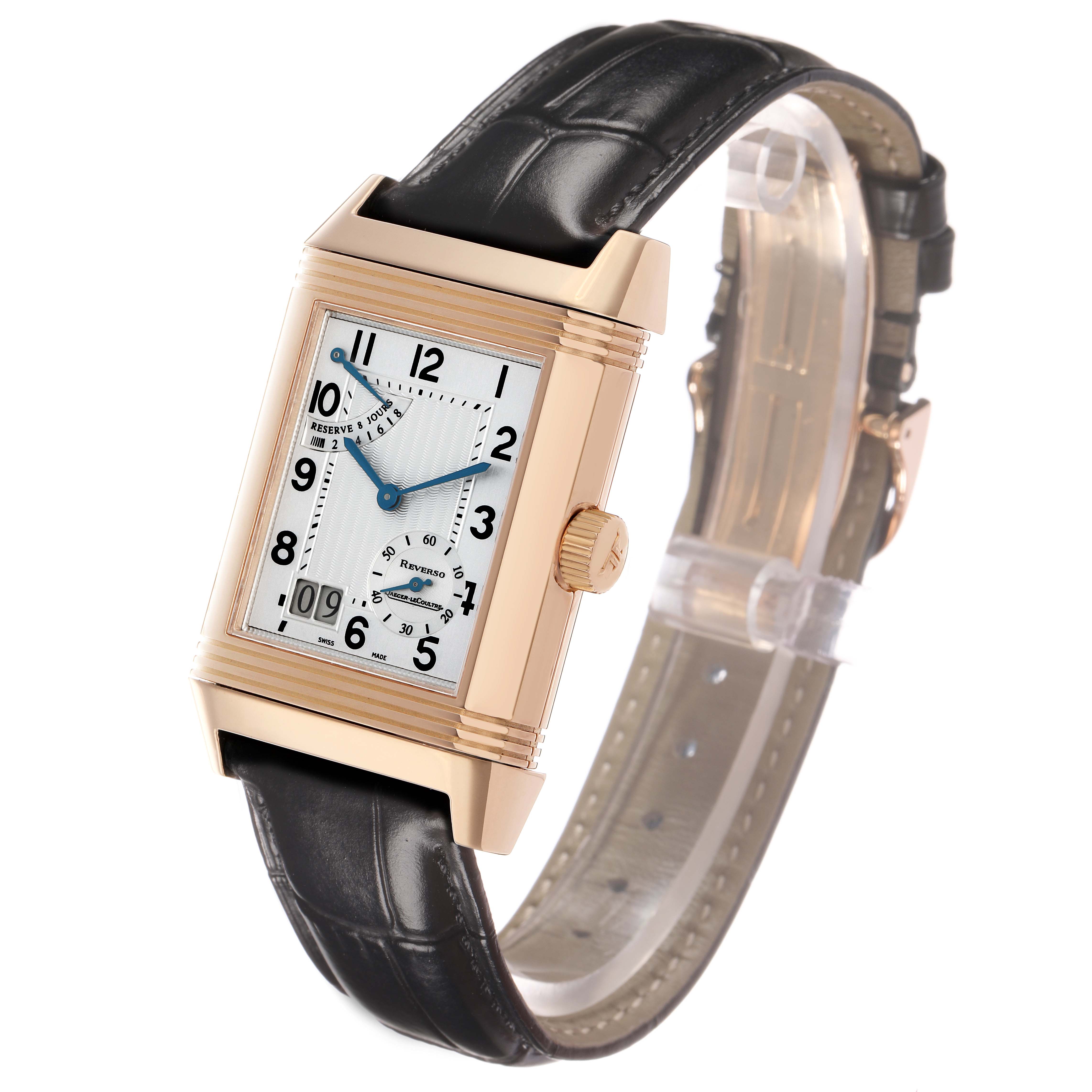 The Jaeger LeCoultre Reverso Q3002401 Men's Rose Gold Silver Dial watch is shown at a slight angle, displaying its rectangular face, leather strap, and side crown.