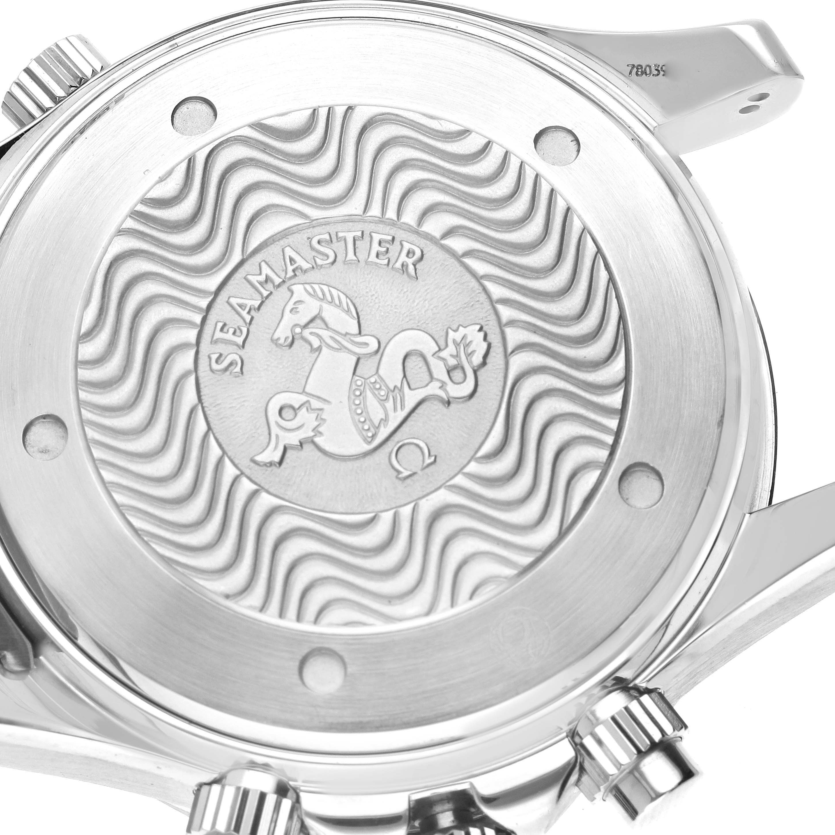 The image shows the back case of an Omega Seamaster 2594.52.00 Men's Stainless Steel Black Dial watch, featuring a wave pattern and an engraved emblem.