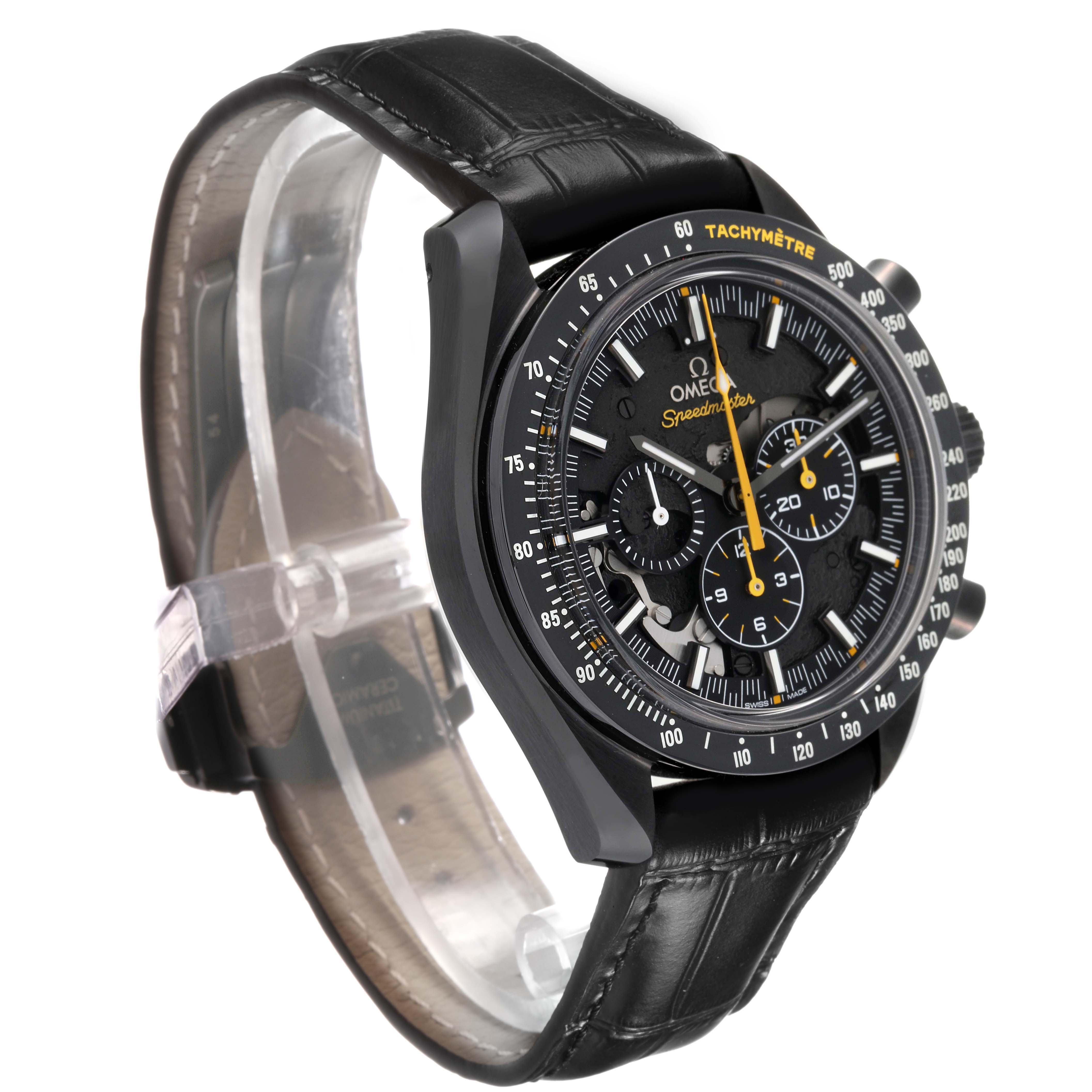 The image shows an Omega Speedmaster 311.92.44.30.01.001 Men's Ceramic Black Dial watch at a three-quarter view, highlighting the dial, tachymeter, and leather strap.