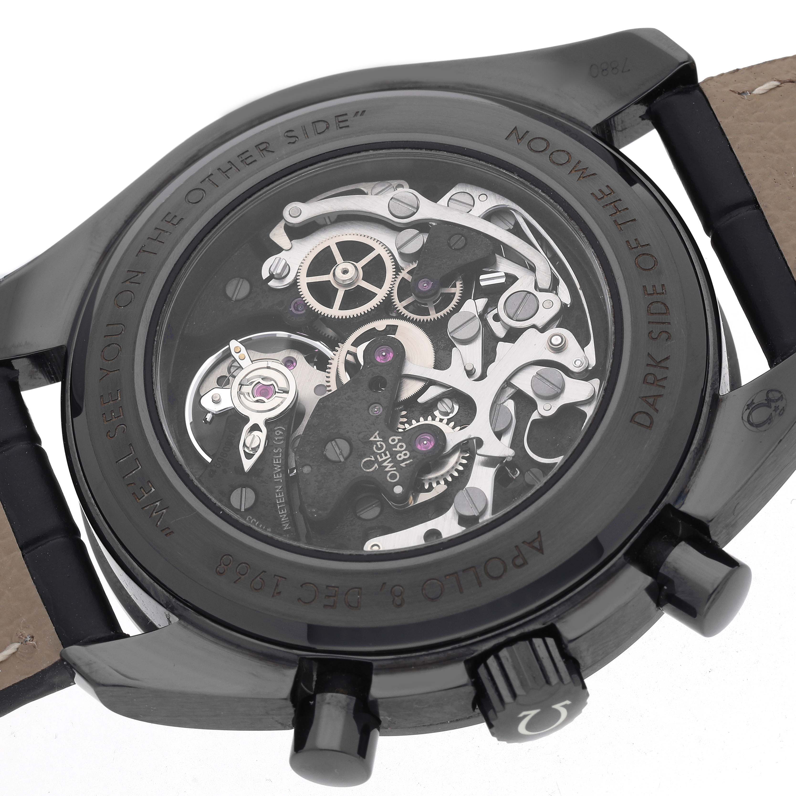 The Omega Speedmaster 311.92.44.30.01.001 Men's Ceramic Black Dial is shown from the back, highlighting its transparent case showcasing the intricate movement and engravings.