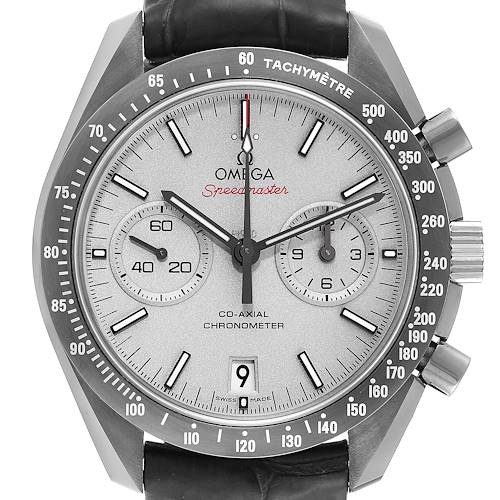 The Omega Speedmaster watch is shown from the front, displaying its face, bezel, and push buttons.