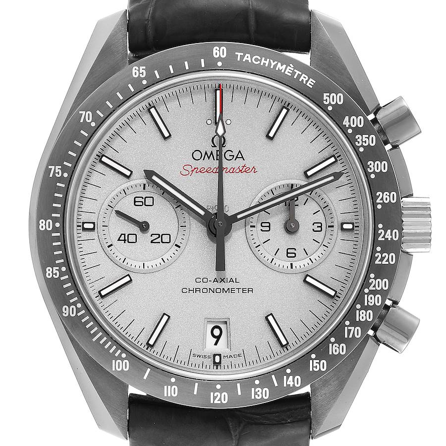 The Omega Speedmaster watch is shown from a front angle, displaying the dial, subdials, bezel, and crown.