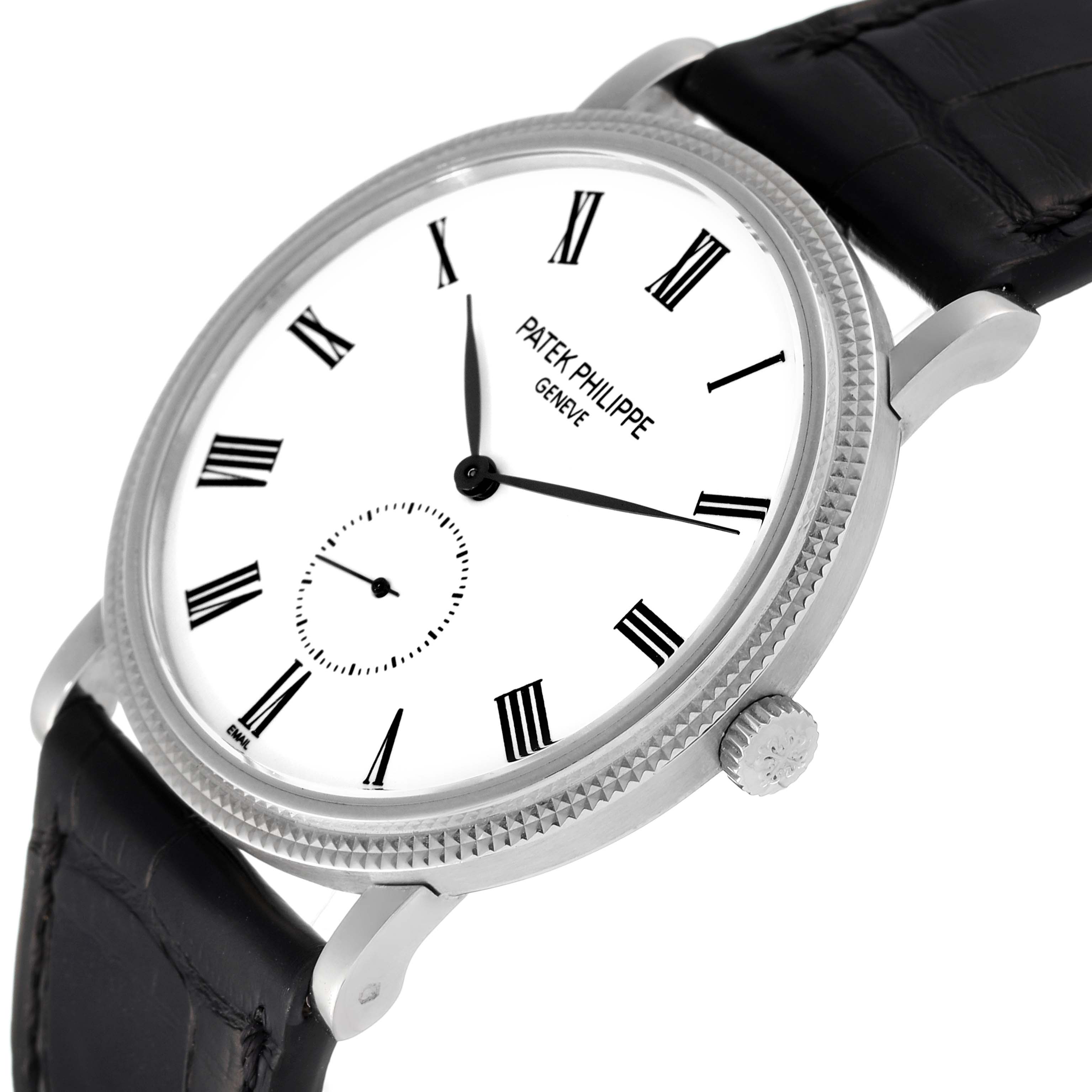 The image shows a Patek Philippe Calatrava 5116G Men's White Gold White Dial 5116G Men's White Gold White Dial watch at an oblique angle highlighting the face, crown, and part of the strap.