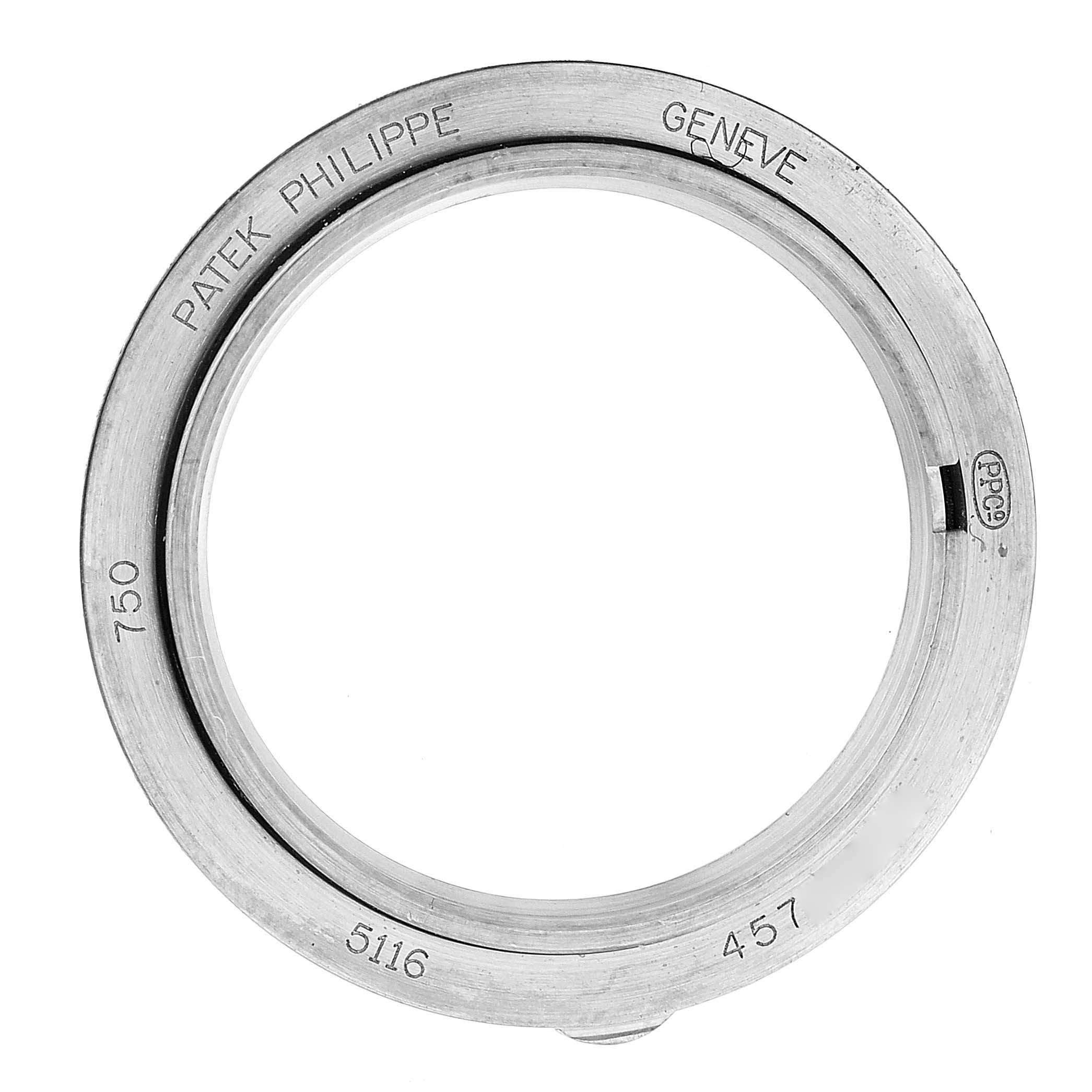 This image shows the metal bezel of a Patek Philippe Calatrava 5116G Men's White Gold White Dial 5116G Men's White Gold White Dial model watch, seen from a top-down angle.