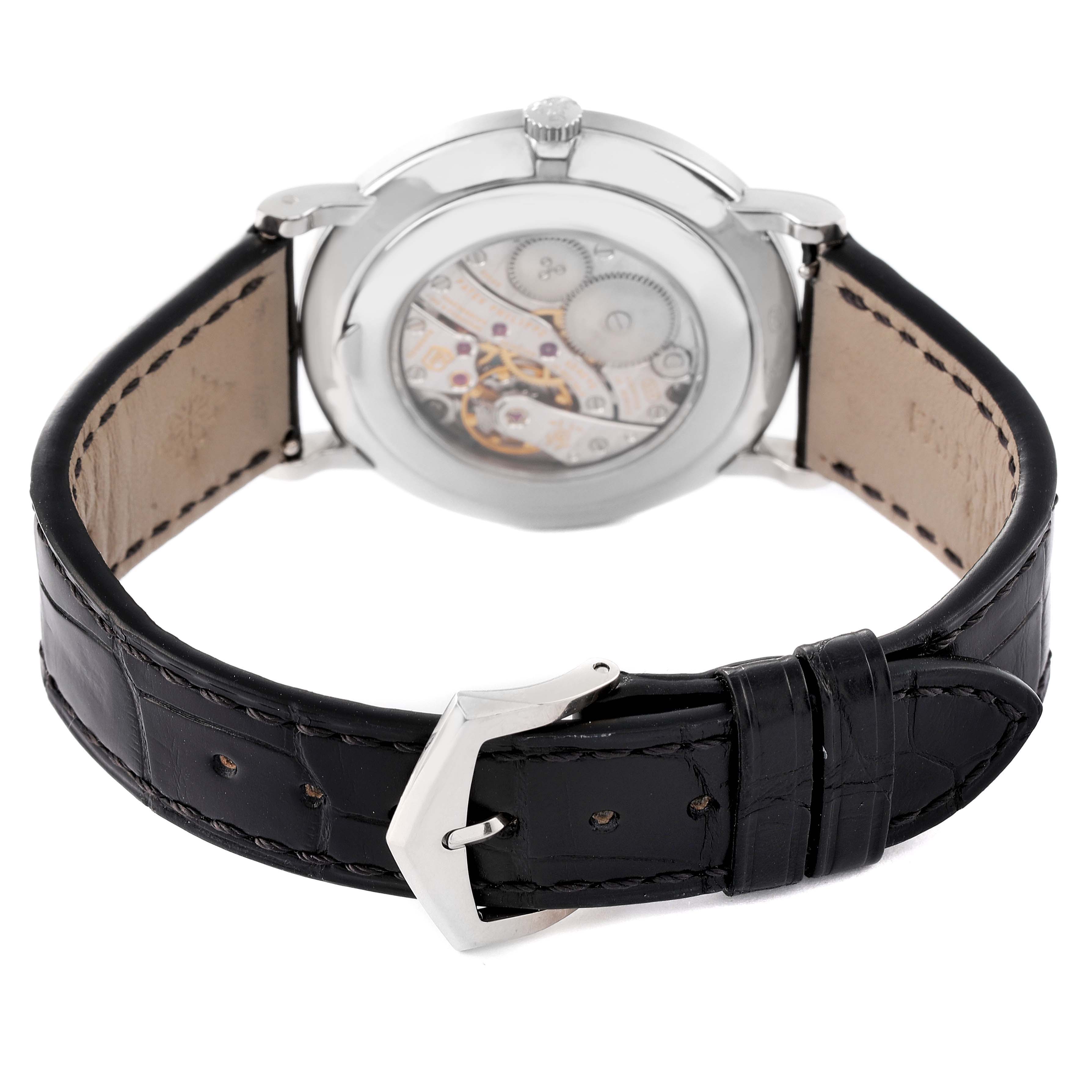 This image shows the back view of a Patek Philippe Calatrava 5116G Men's White Gold White Dial 5116G Men's White Gold White Dial watch, highlighting its leather strap and transparent case back.