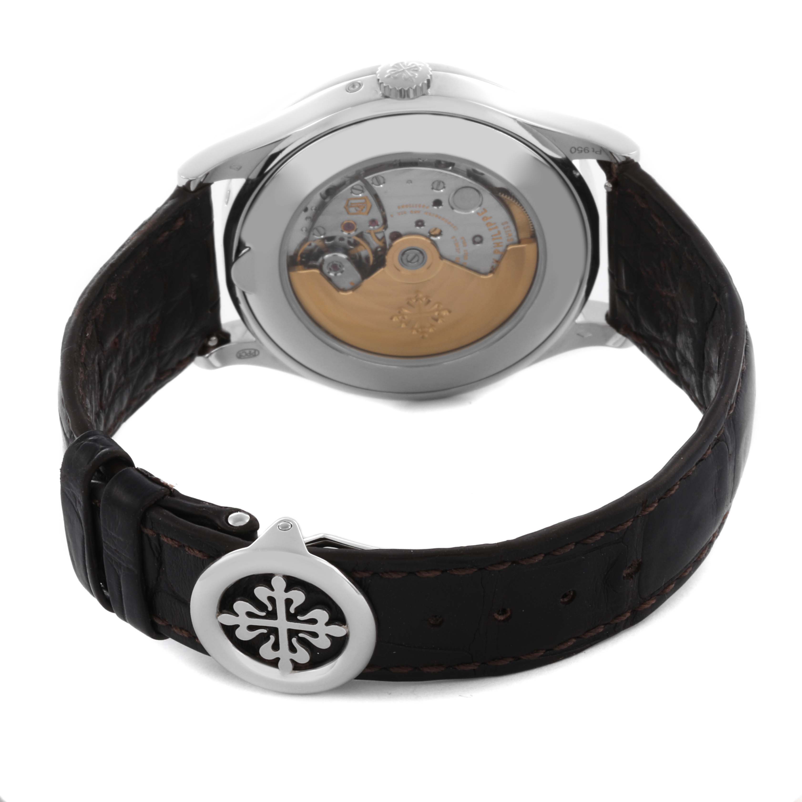 The Patek Philippe Complications 5496P-014 Men's Platinum Brown Dial 5496P-014 Men's Platinum Brown Dial watch is shown from the back, highlighting the movement and strap clasp.