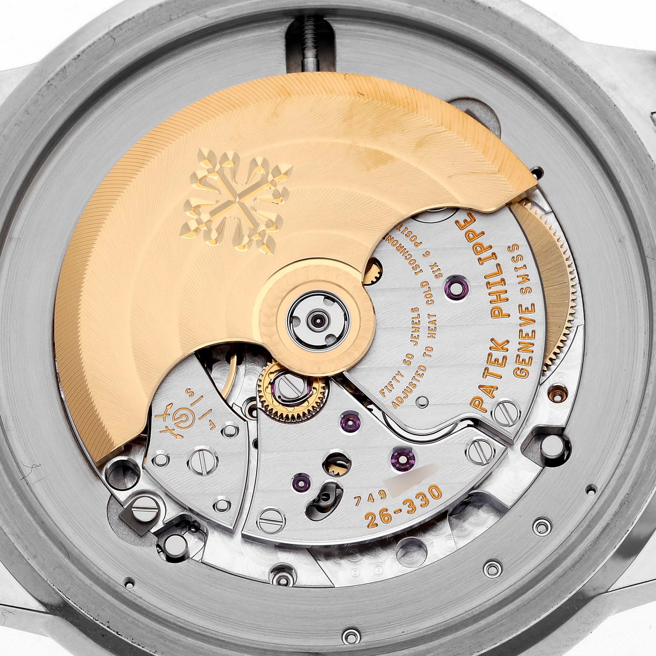 The image shows the back view of the Patek Philippe Complications 5212A-001 Men's Stainless Steel Silver Dial 5212A-001 Men's Stainless Steel Silver Dial watch movement, highlighting the rotor and intricate mechanics.