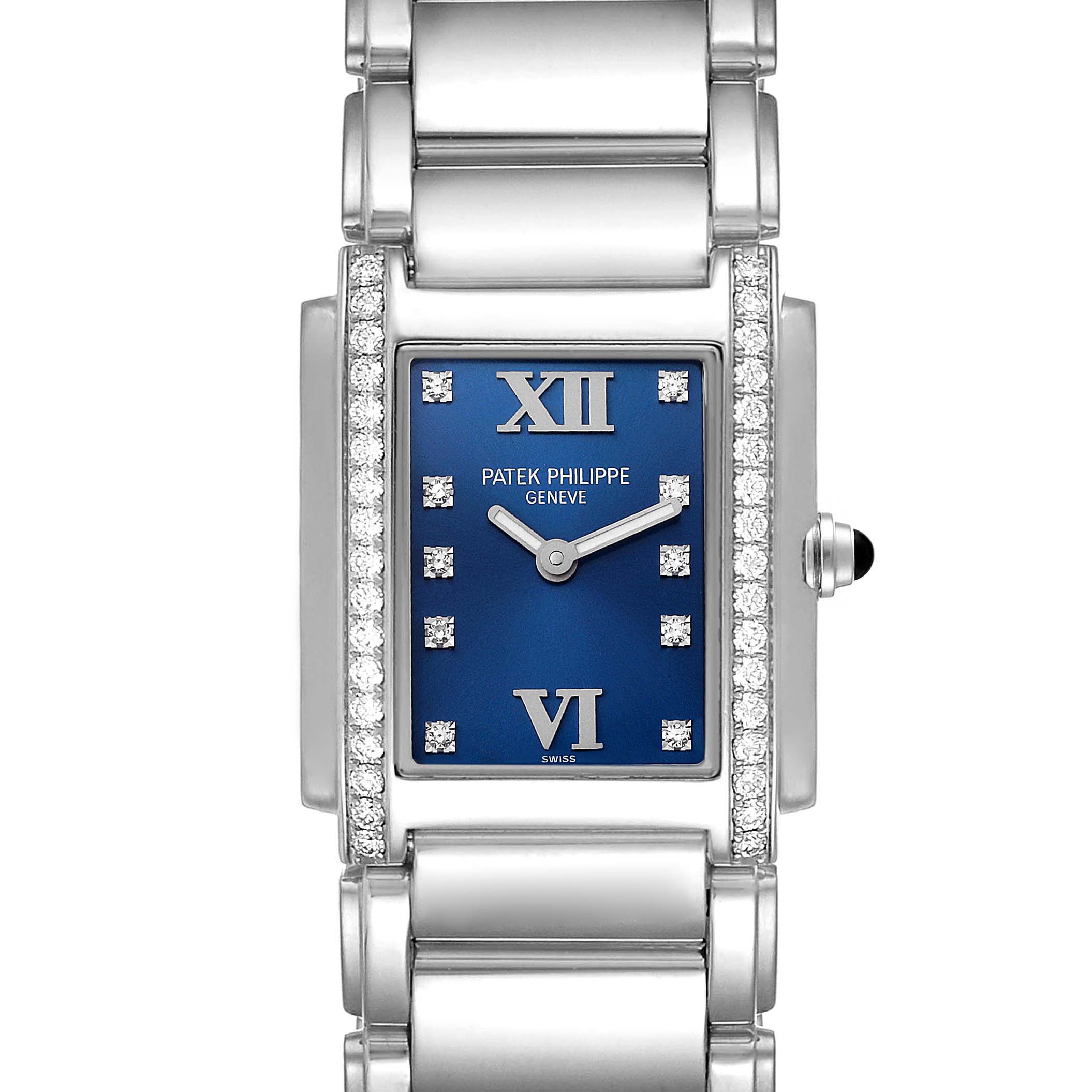 This is a close-up front view of the Patek Philippe Twenty-4 4910-10A-012 Women's Stainless Steel Blue Dial 4910-10A-012 Women's Stainless Steel Blue Dial model watch showcasing its blue dial, Roman numerals, and diamond accents.