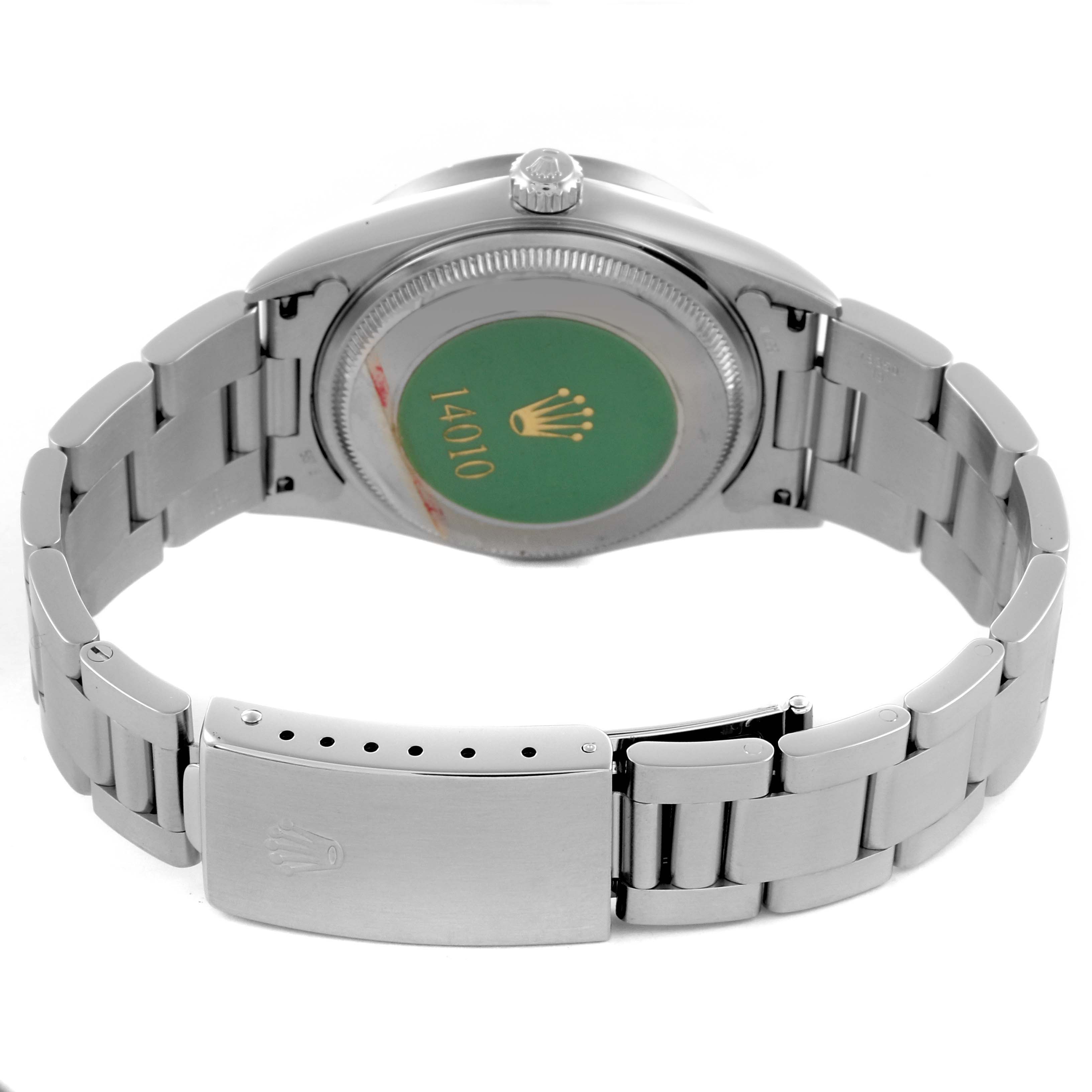 The image shows the back and bracelet of a Rolex Air-King 14010 Men's Stainless Steel Black Dial 14010 Men's Stainless Steel Black Dial watch, featuring the clasp and case back.