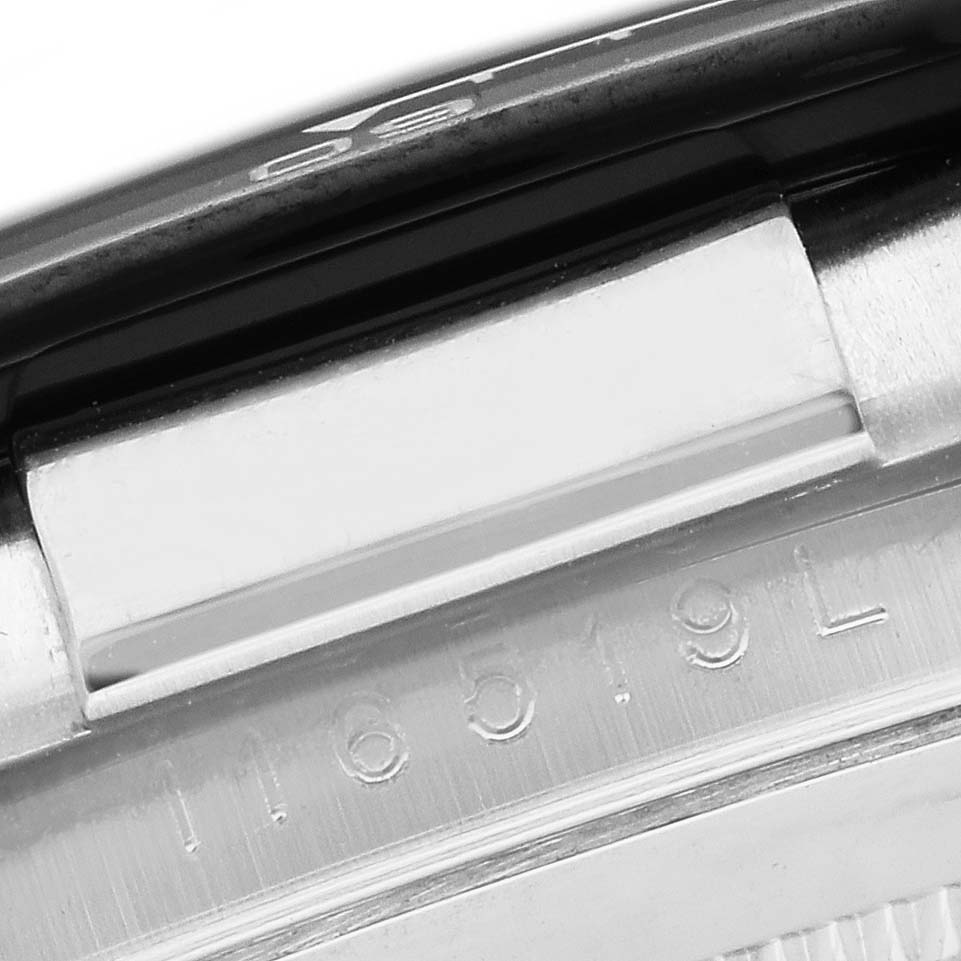 The image shows the serial number area and part of the clasp of a Rolex Daytona 116519LN Men
s White Gold Silver Dial 116519LN Men
s White Gold Silver Dial watch.