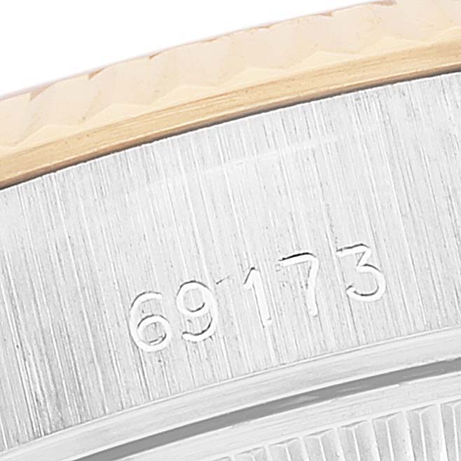 The image shows a close-up of the serial number (69173) on the case of a Rolex Datejust 69173 Women's Steel and Gold (two tone) White Dial 69173 Women's Steel and Gold (two tone) White Dial watch, viewed from an angle.