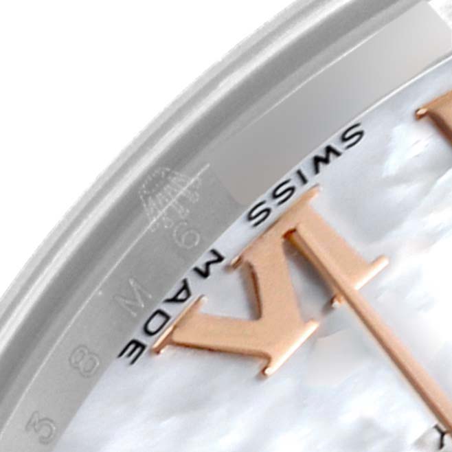 The image shows a close-up of the Rolex Mid-Size 178341 Women's Steel and Gold (two tone) Mother of Pearl Dial 178341 Women's Steel and Gold (two tone) Mother of Pearl Dial watch face, focusing on the "VI" hour marker and "SWISS MADE" text.