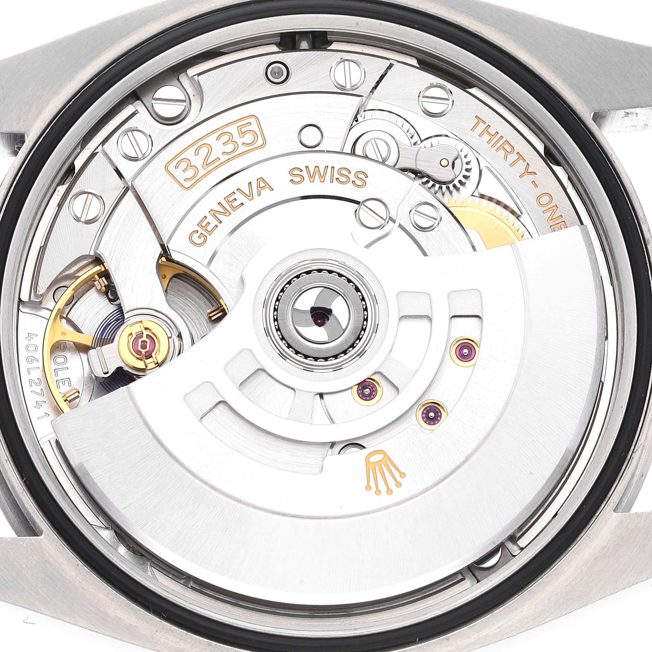 This image shows the back view of the Datejust Rolex watch, highlighting the exposed 3235 movement and intricate internal mechanics.