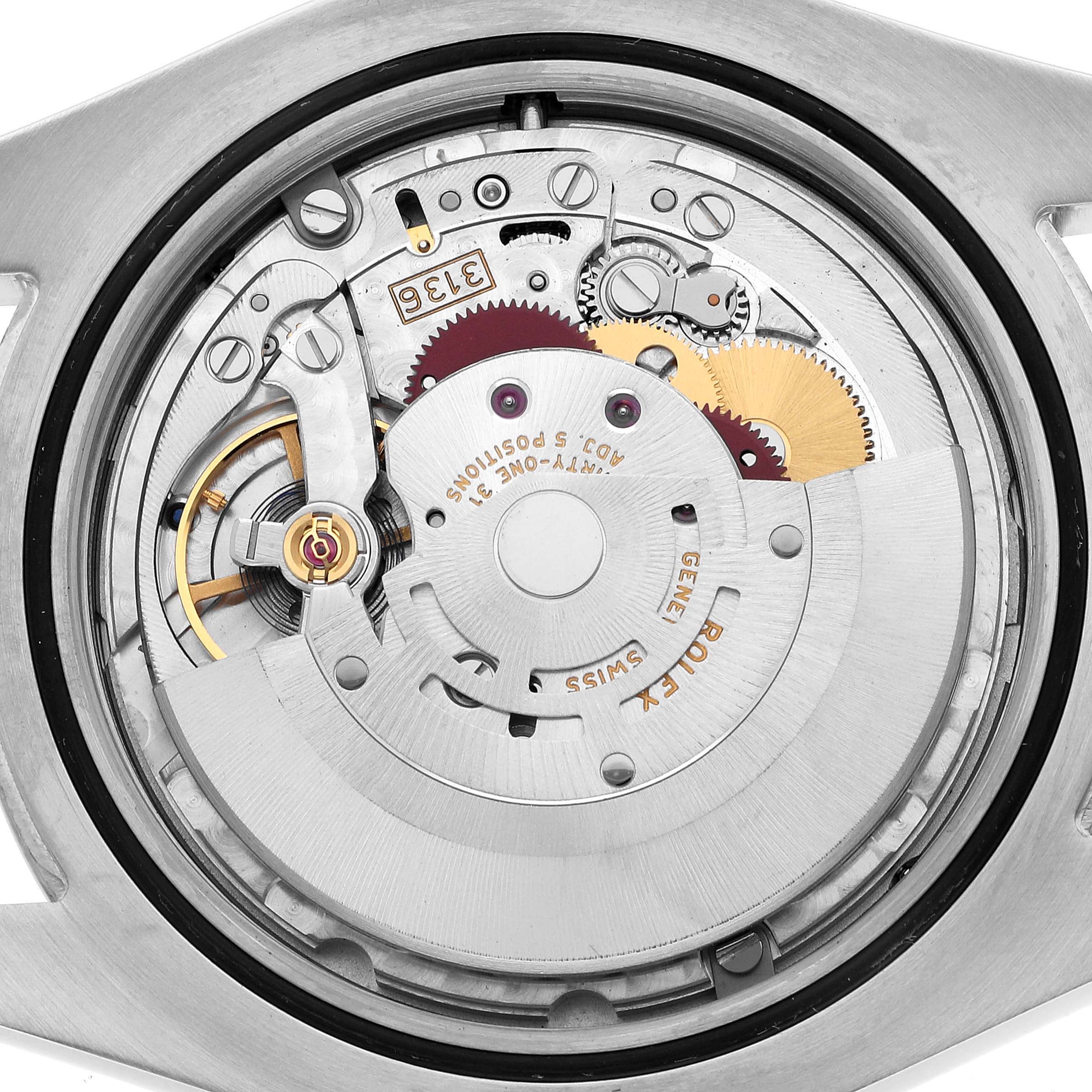 The image shows the internal mechanism of a Rolex Datejust 41 116334 Men's Stainless Steel Silver Dial, focusing on the movement components from the back view.